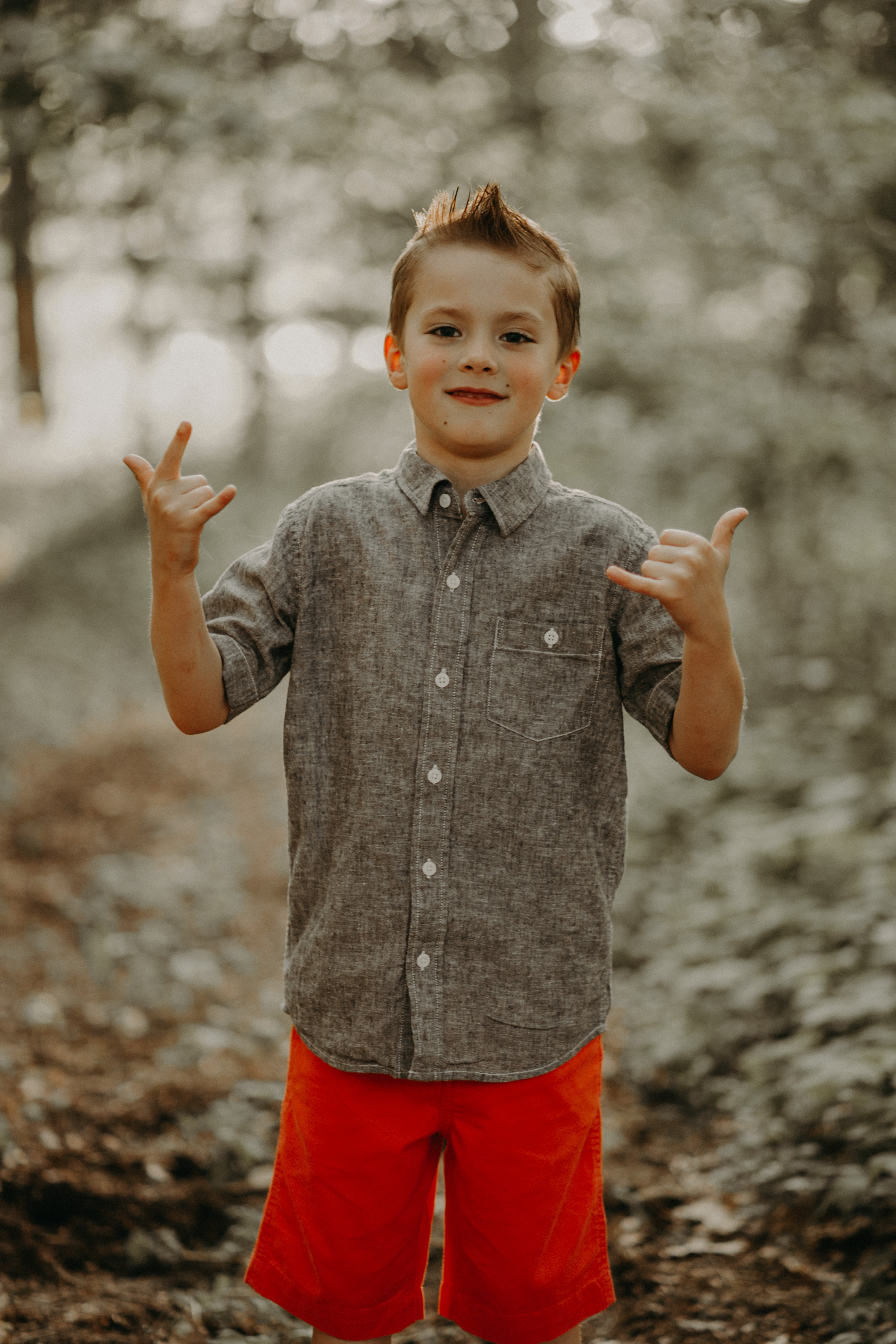 silly boy in River Falls WI forest