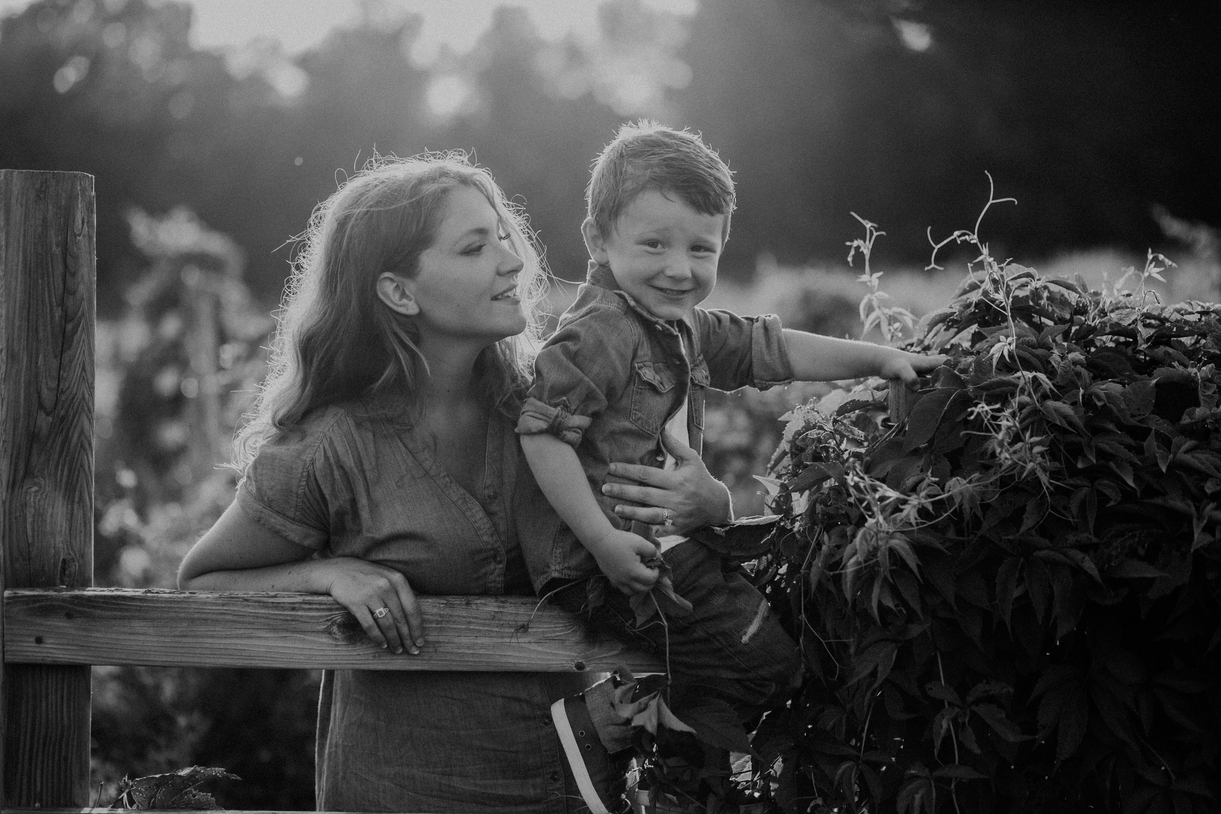  black and white lifestyle image of mom and son in River Falls 