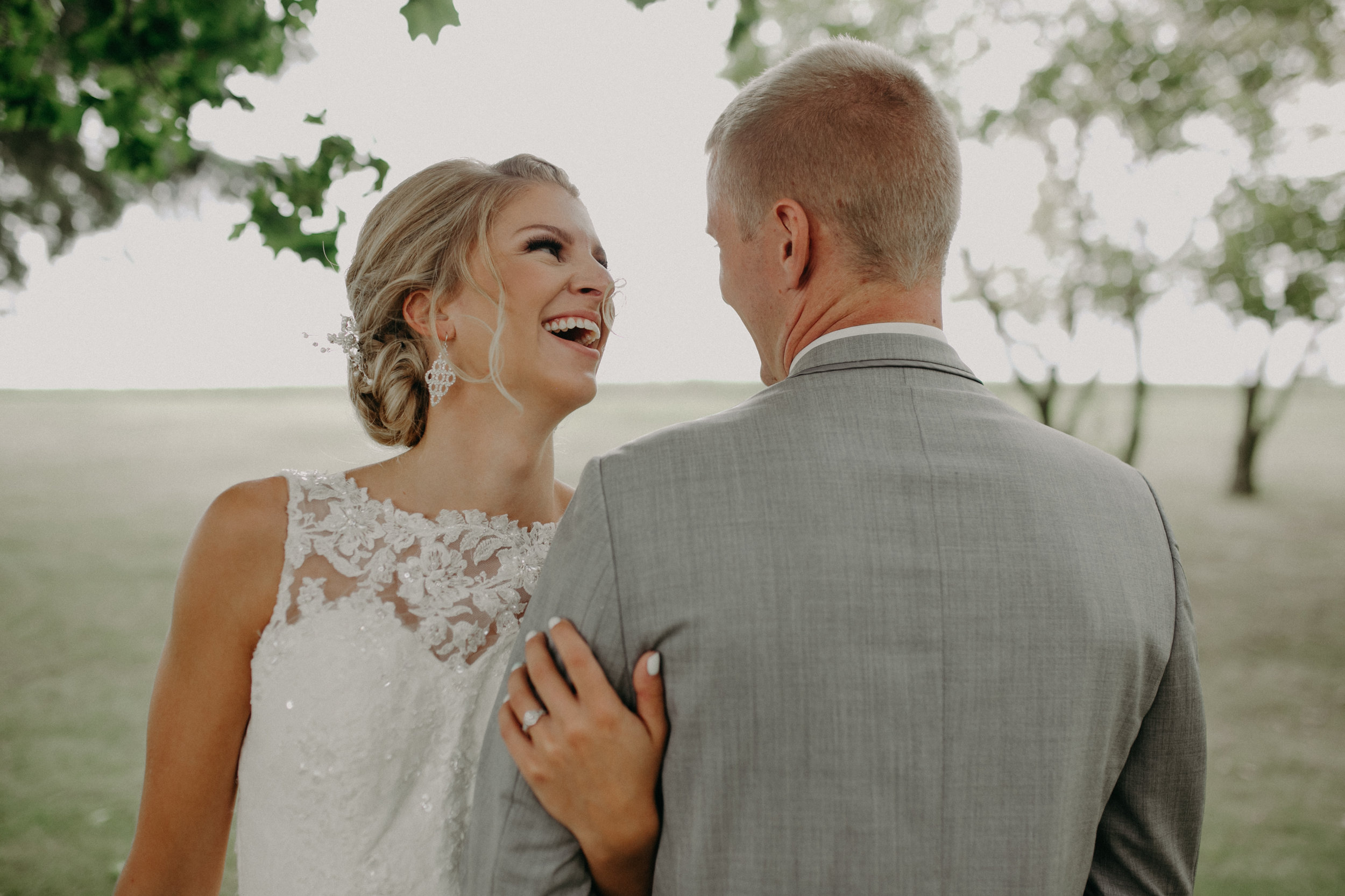 bride-groom-laughing-wedding-christ-lutheran-church-marshfield