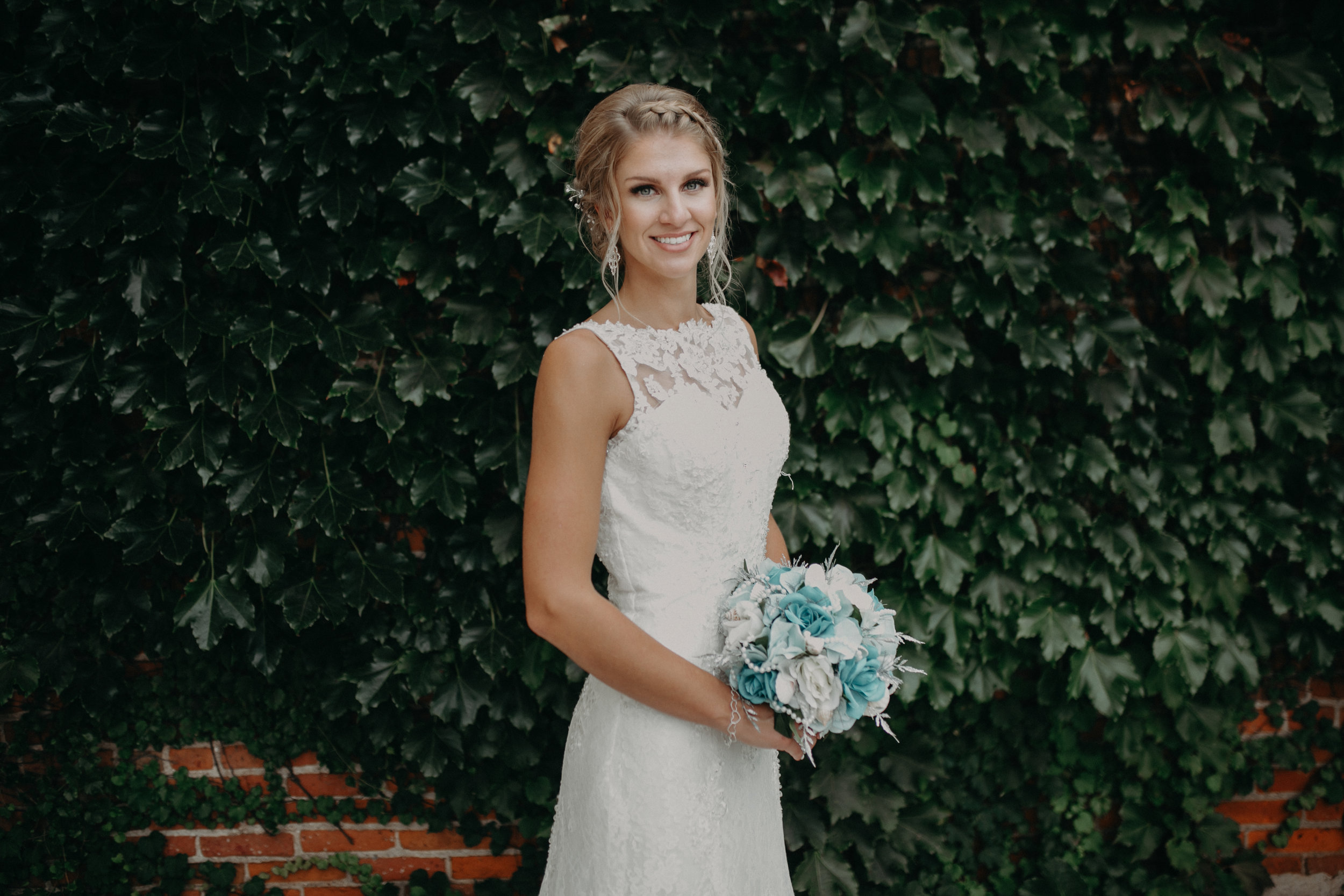Andrea Wagner Photography with Tiffany Lenz at her wedding in Marshfield WI by Thomas House