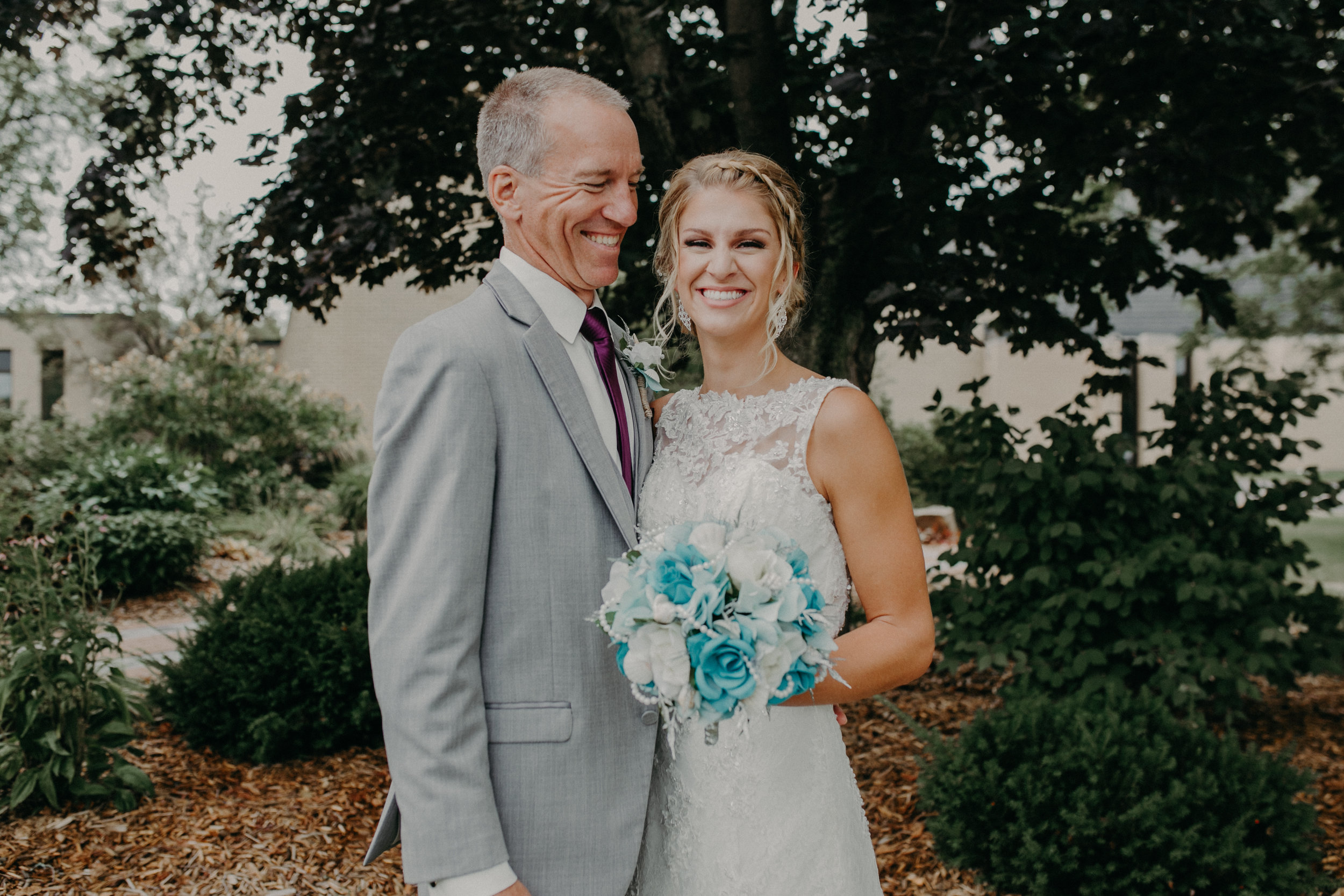  Tiffany Stargardt and her father pose for pictures at wedding by Andrea Wagner Photography 