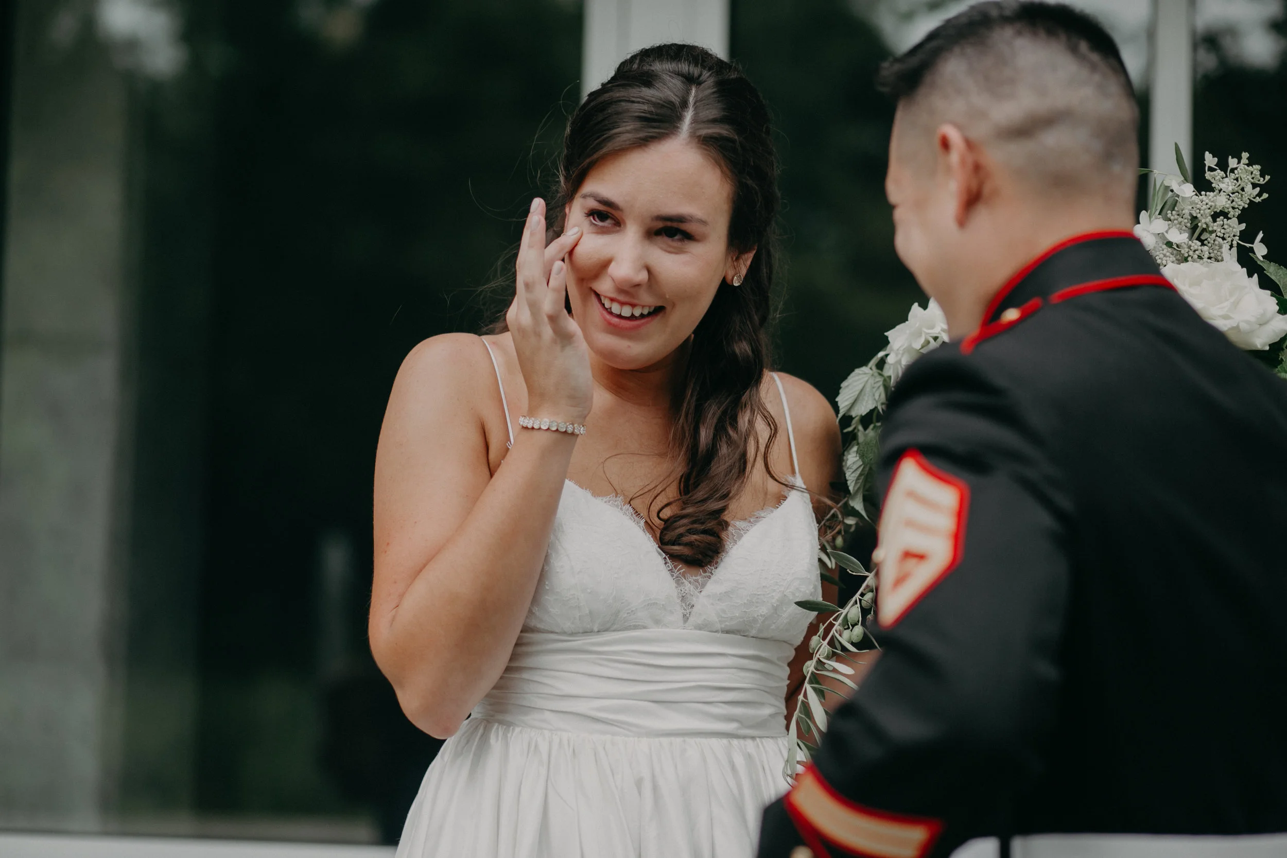 Military groom sees his bride for the first time at Hotel Landing