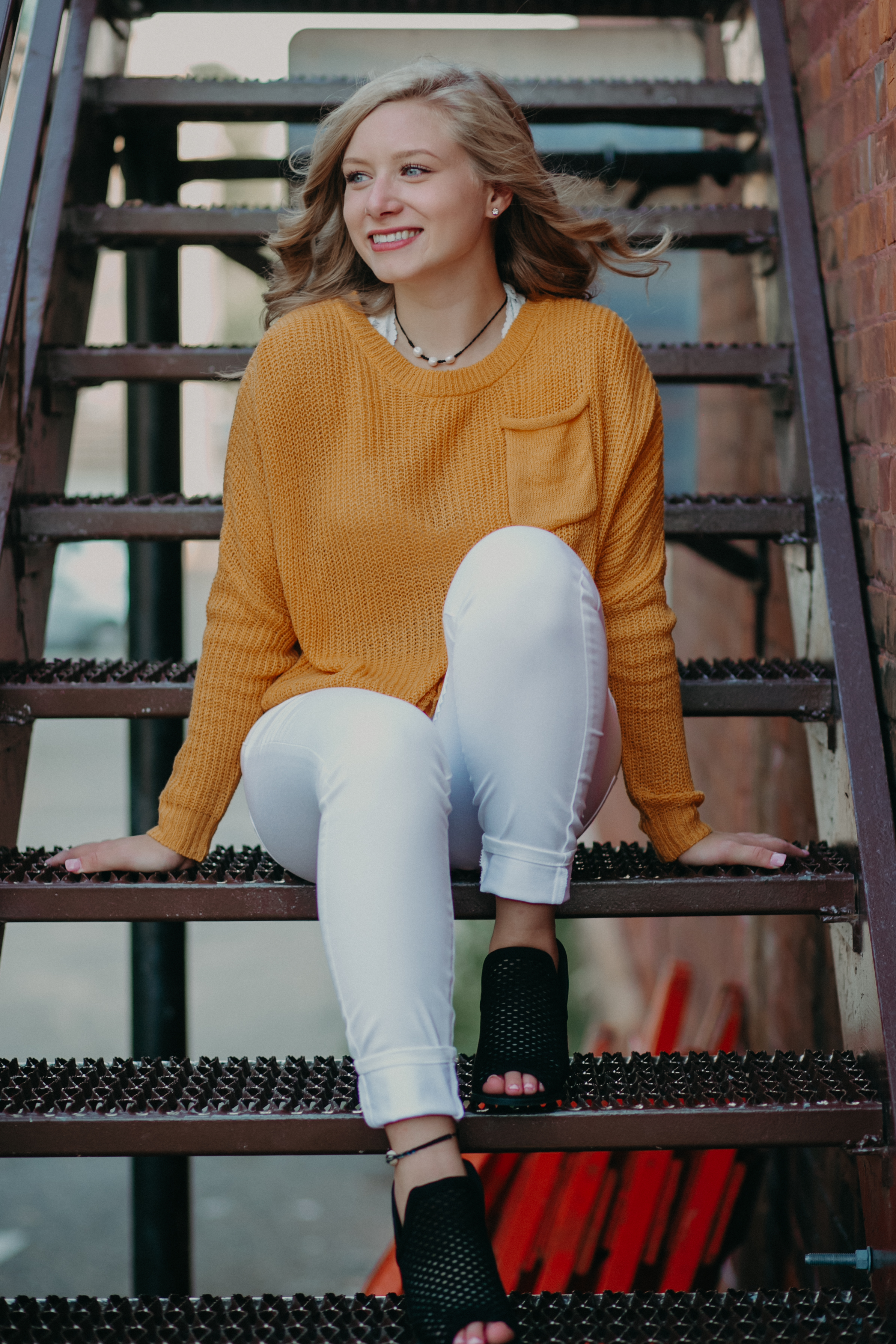 senior-stairs-hudson-wi-yellow-sweater