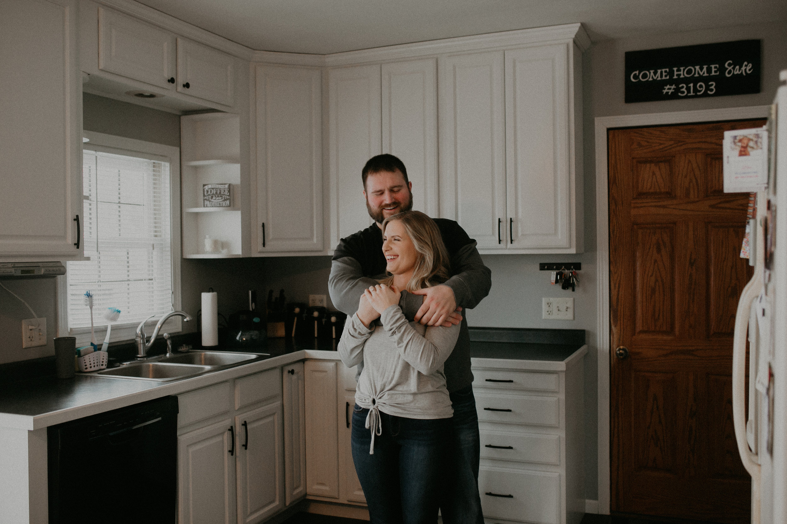 engagement session in kitchen in Athens WI