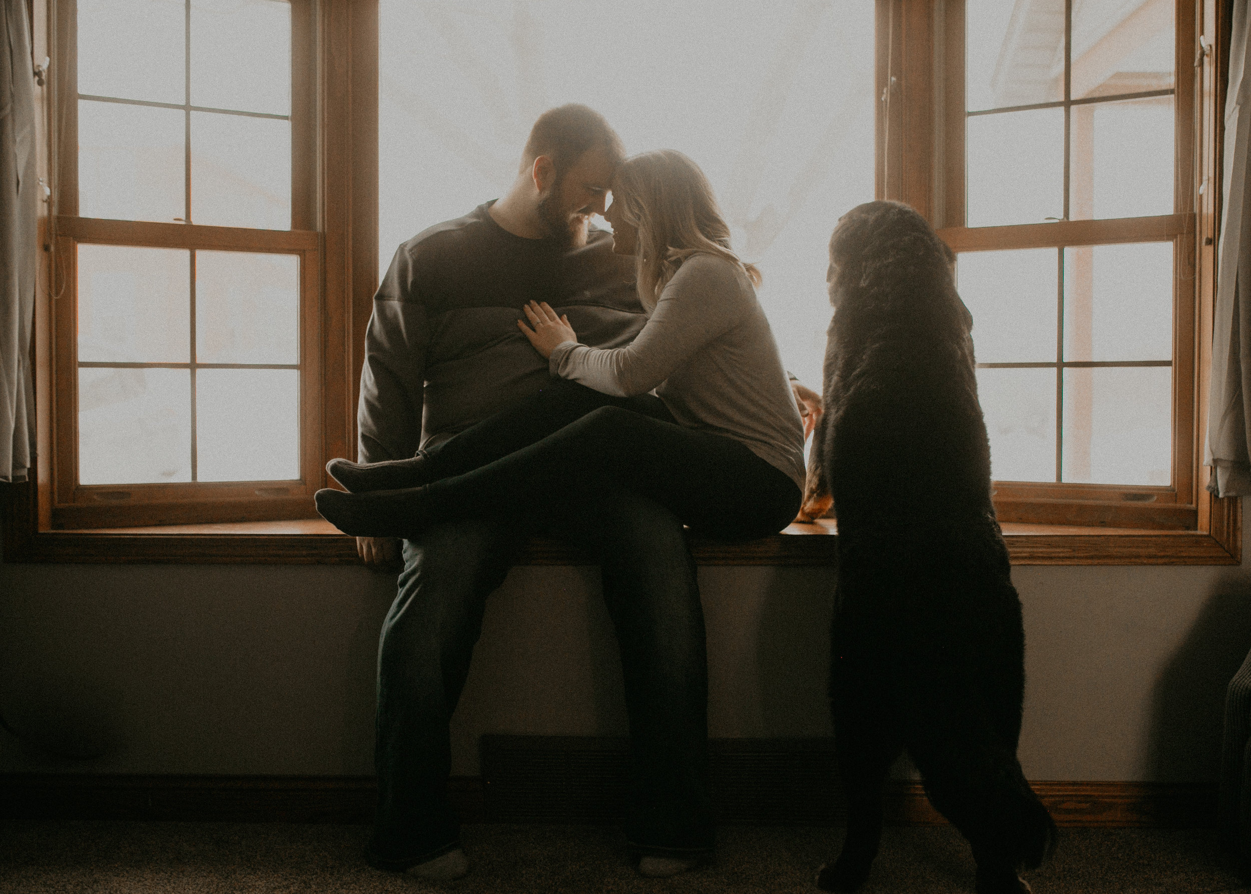  natural light photographer Andrea Wagner shoots an engagement session in a home in Athens WI 