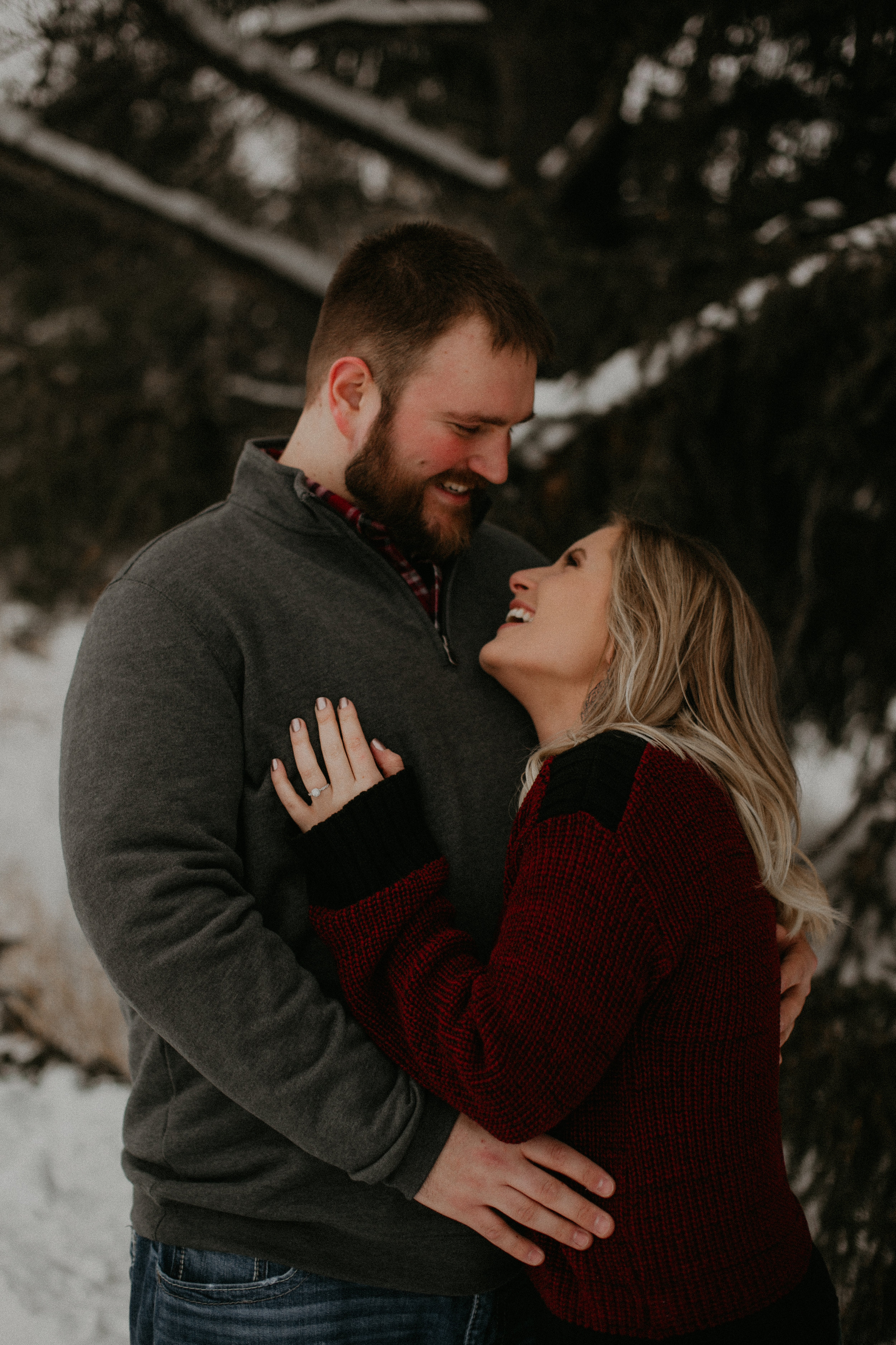  Athens WI couple snuggles in the snow during a winter engagement session 