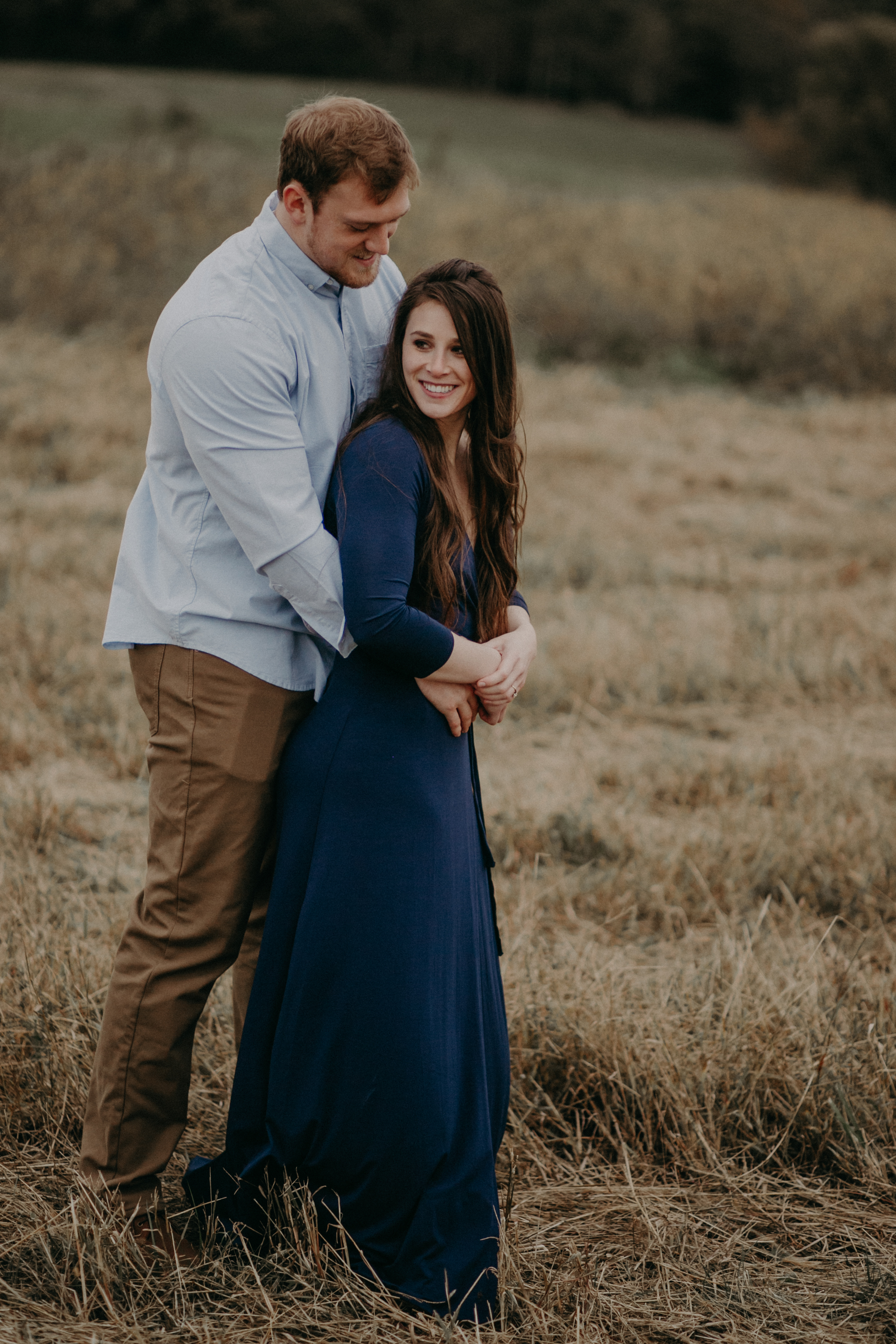  A Hastings MN engagement session in a field overlooking the St Croix River 