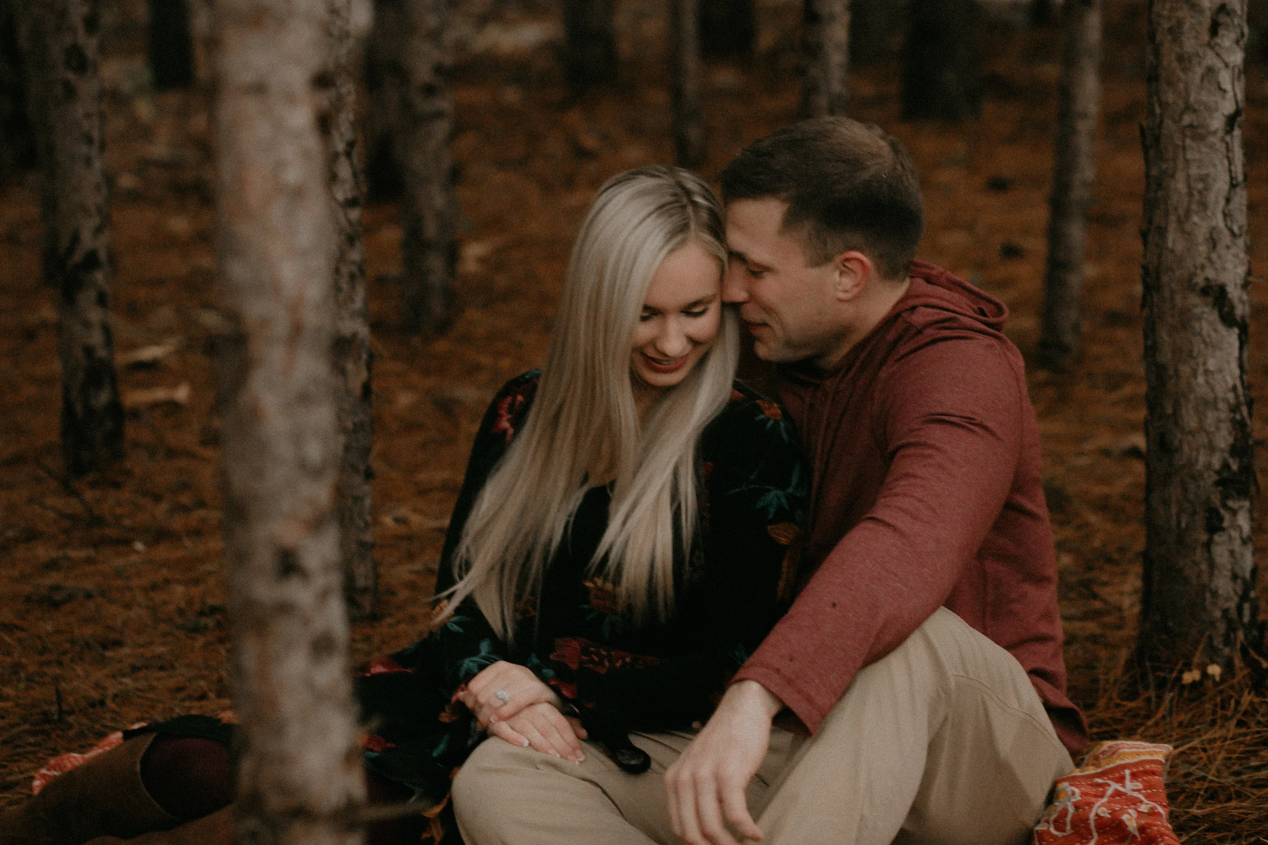 Andrea Wagner Photography captures a candid happy moment during an engagement session at Burlap and Bells in Wisconsin