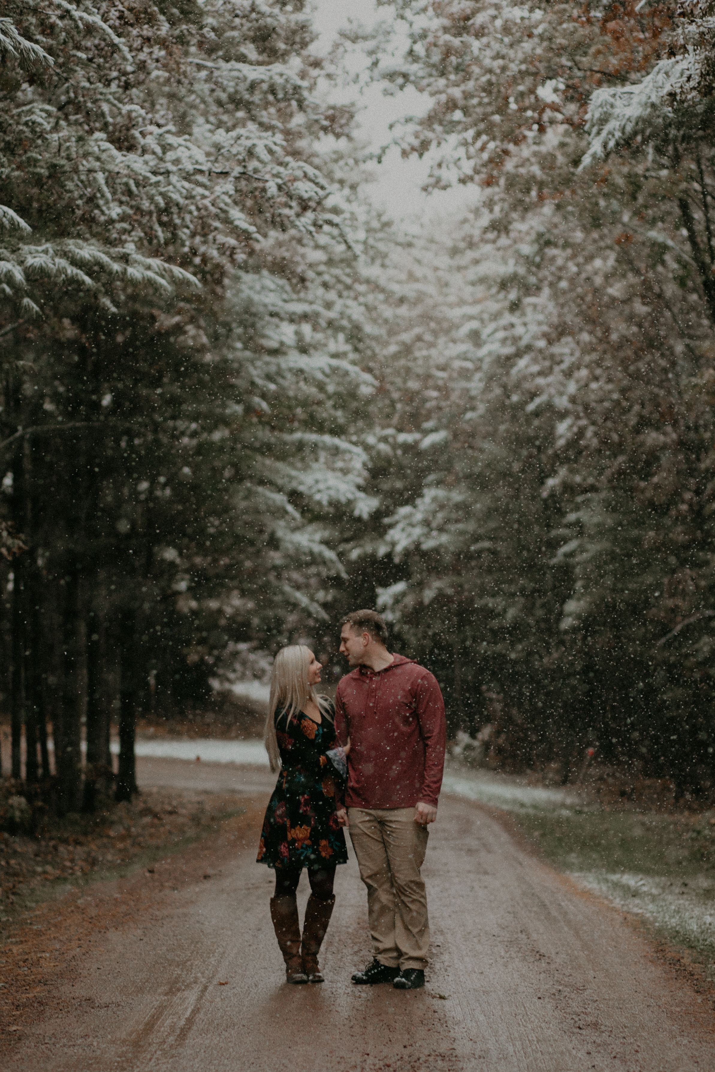 Burlap and Bells property in River Falls WI allows engagement photos in a winter wonderland during a fall engagement session