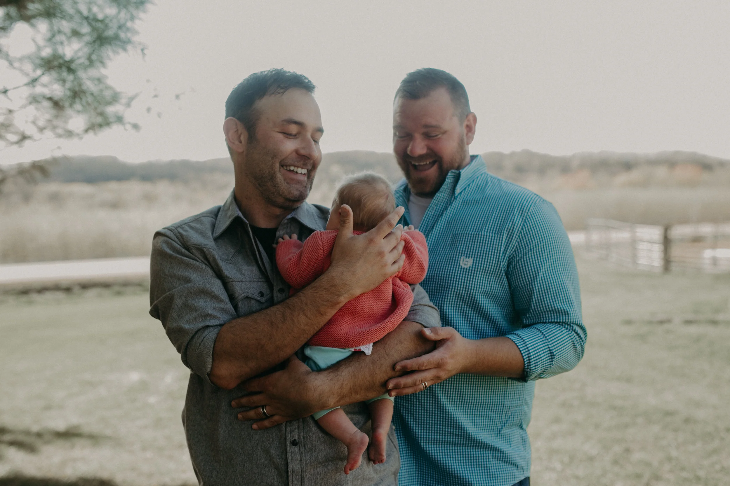 proud same-sex couple become proud dads after adopting their daughter and bringing her home to River Falls WI