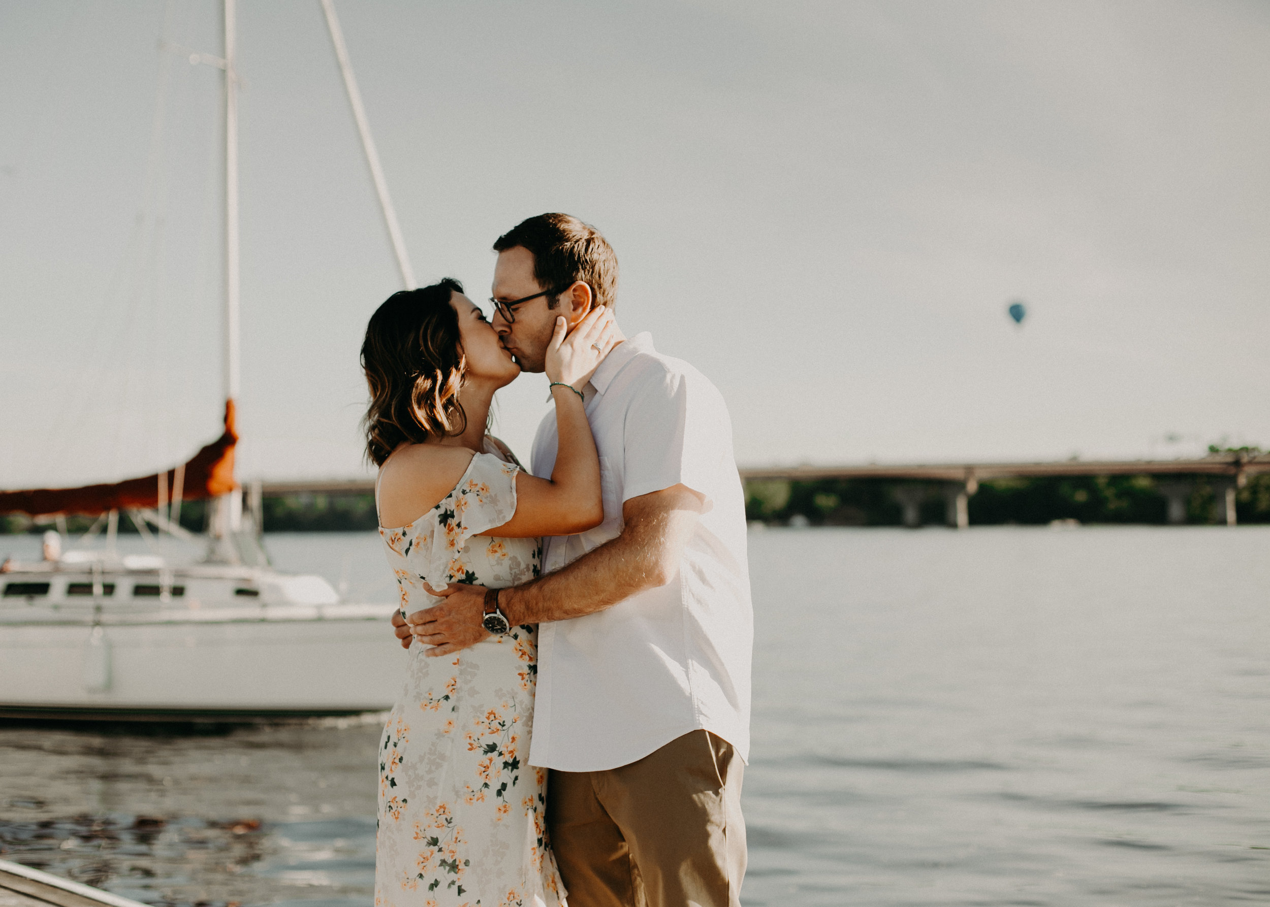  Andrea Wagner Photography captures real and intimate moments between an engaged couple in Hudson WI at the St Croix Marina 