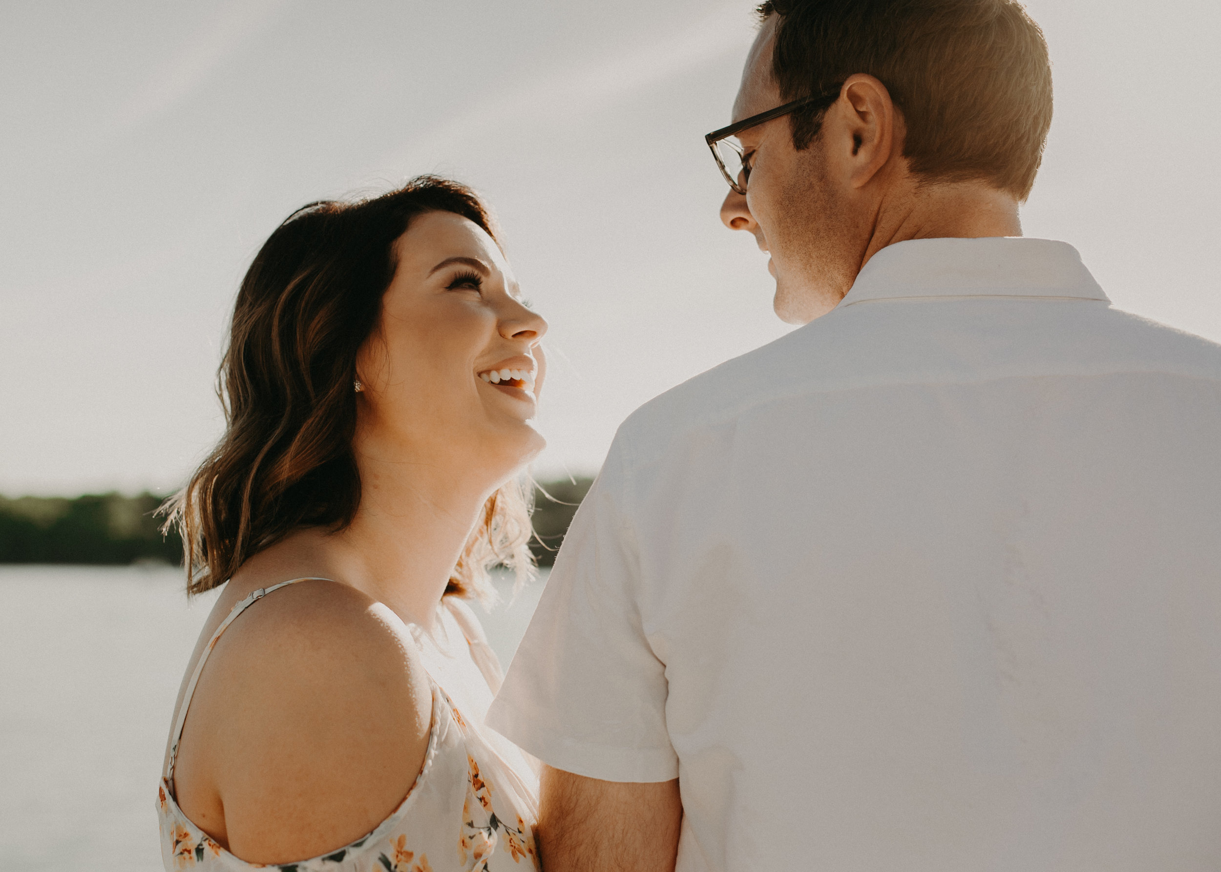  Molli smiles at her fiance Justin during an engagement session in Hudson WI 