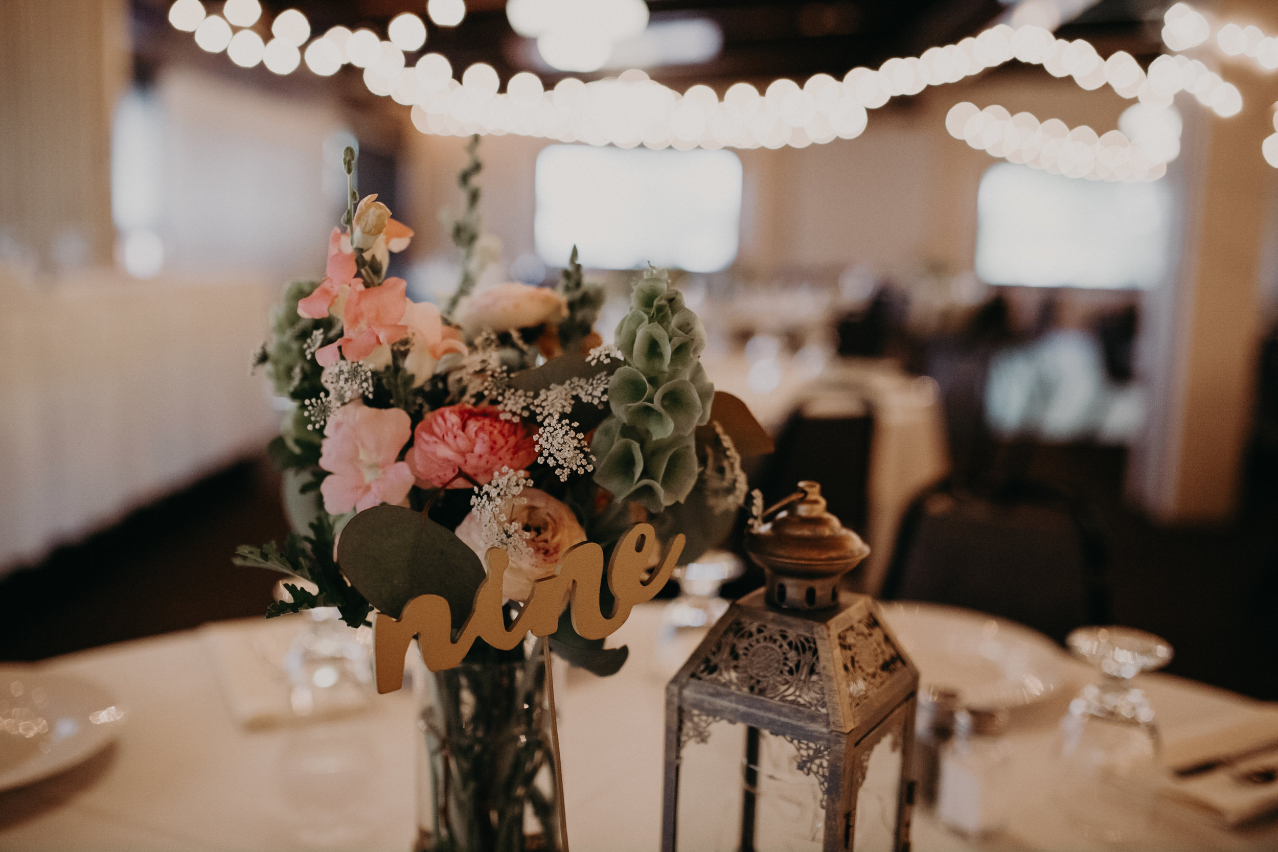  Mill Creek Gardens floral arrangements at a reception at RiverEdge Golf Club in Marshfield WI 