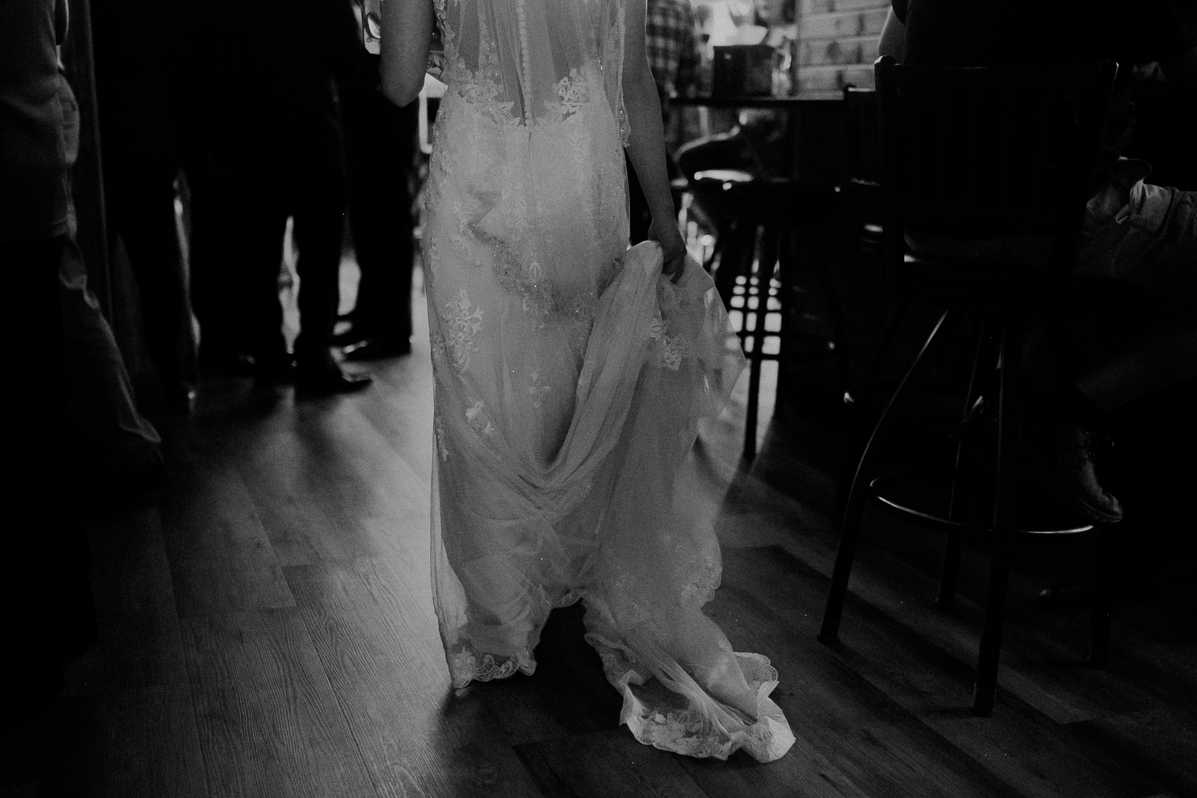  bride walks into Nutz Deep II bar after her wedding ceremony 