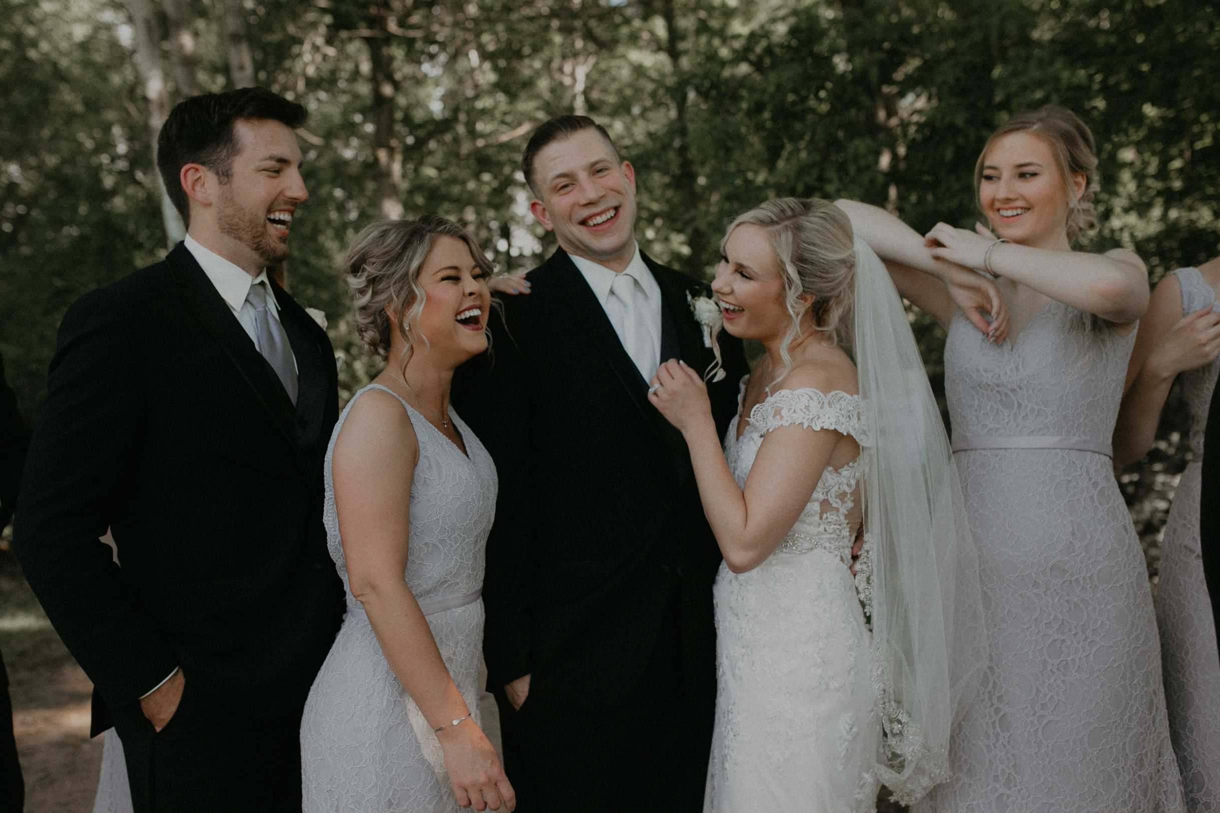  Andrea Wagner Photography captures real and authentic moments of the bridal party at RiverEdge Golf Club in Marshfield Wi 