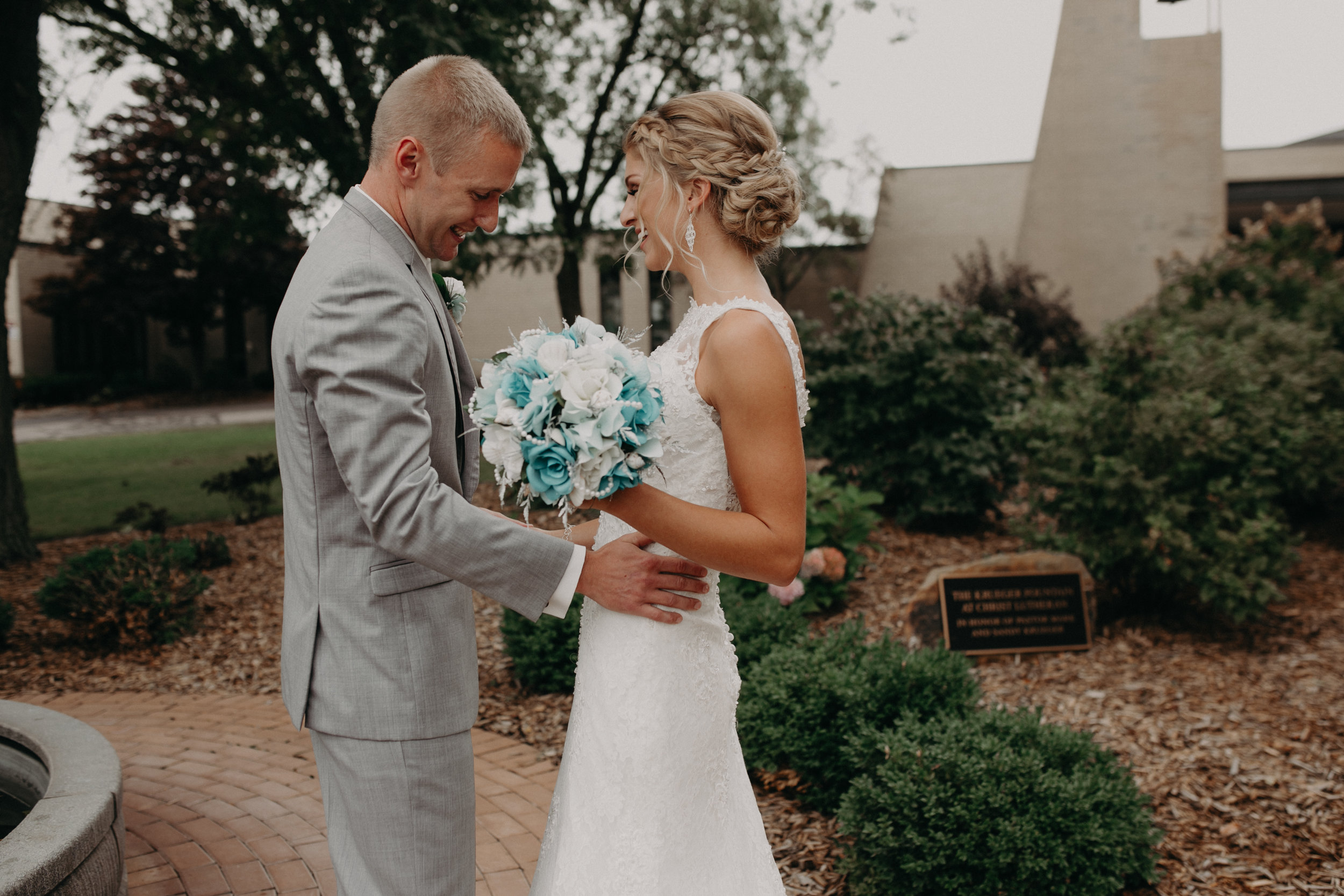 wedding photographer Andrea Wagner captures a joyful first look before Marshfield WI wedding