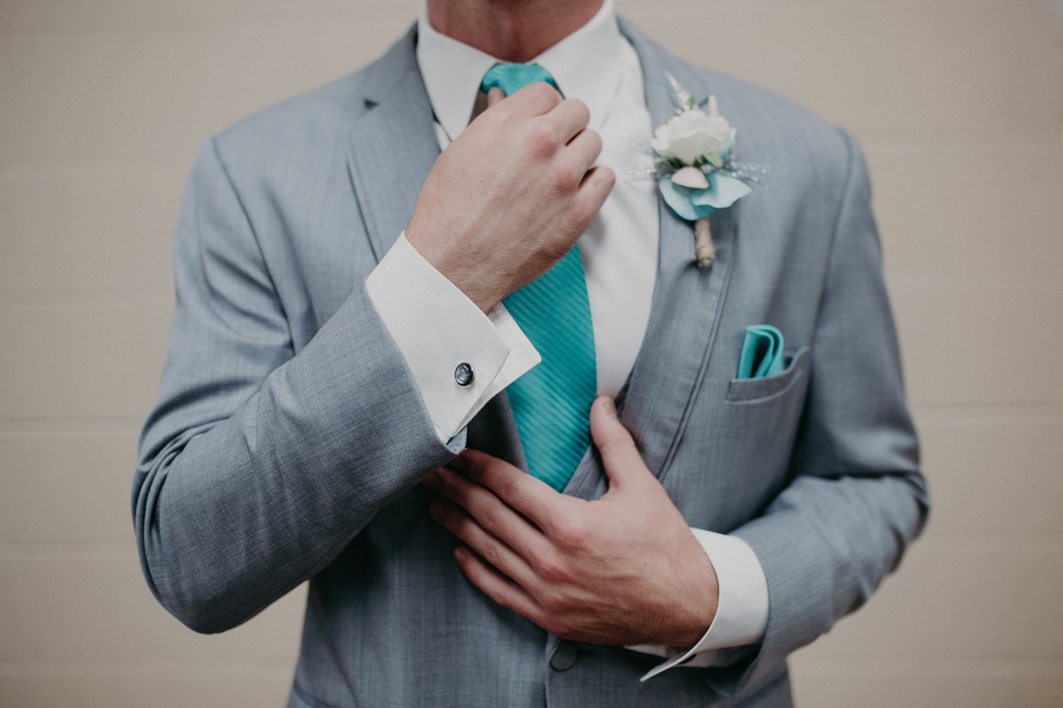 creative photo of a groom getting ready before his wedding captured by Twin Cities Wedding Photographer Andrea Wagner