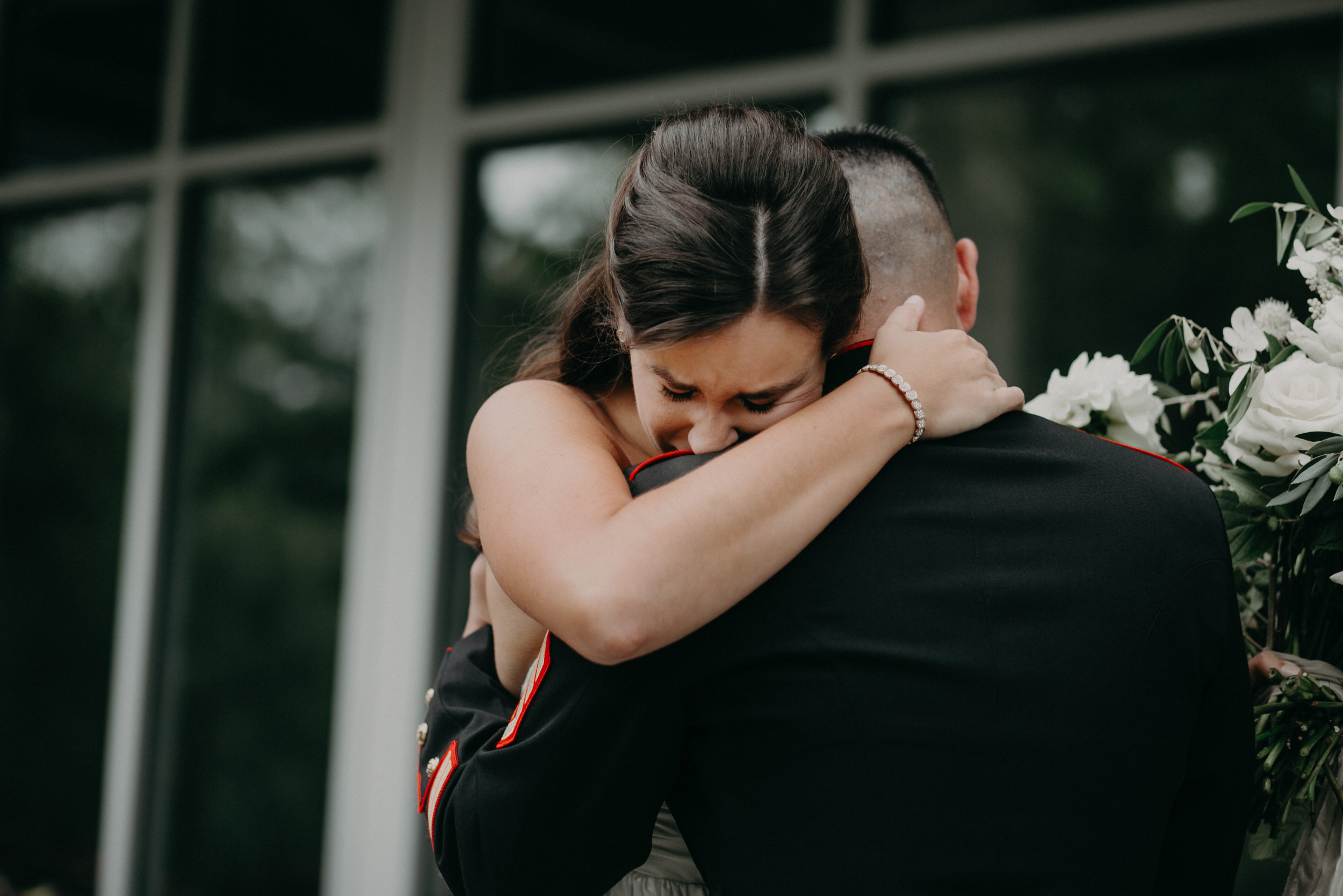 Andrea Wagner Photography captures raw and real candid moments of emotion during a wedding on Lake Minnetonka