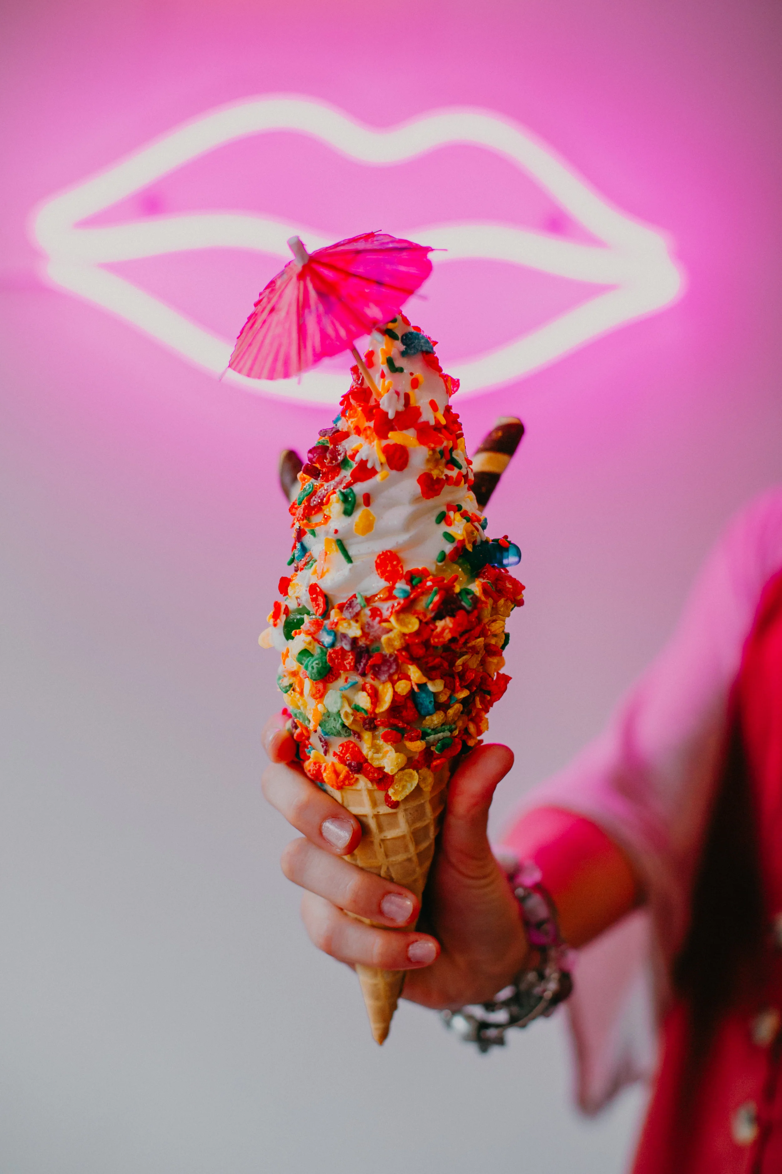 amazing and colorful neon ice cream cone at MN Nice in Stillwater MN during a senior session