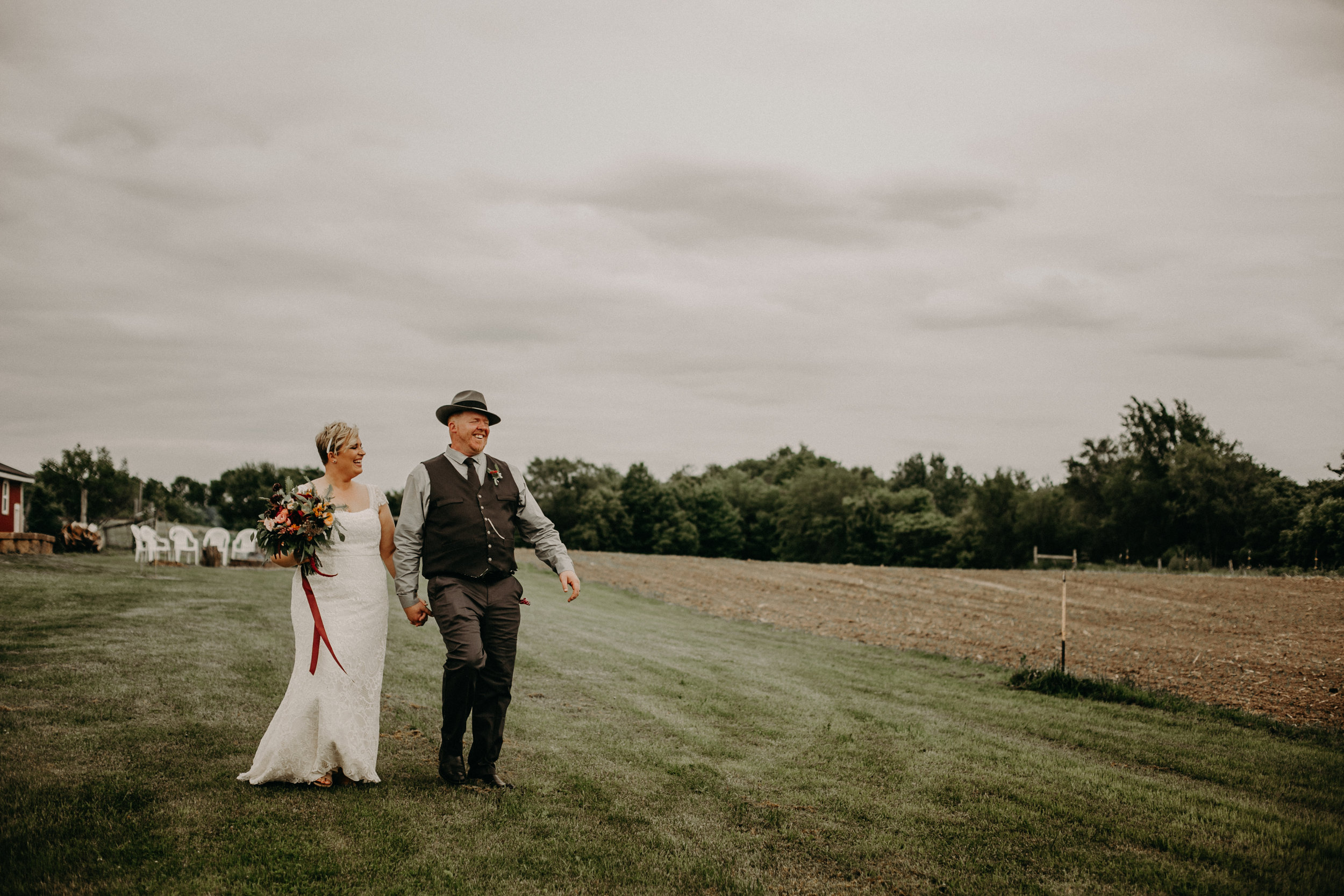  Andrea Wagner Photography provides wedding day photography in Ellsworth WI at Jean Acres Barn 