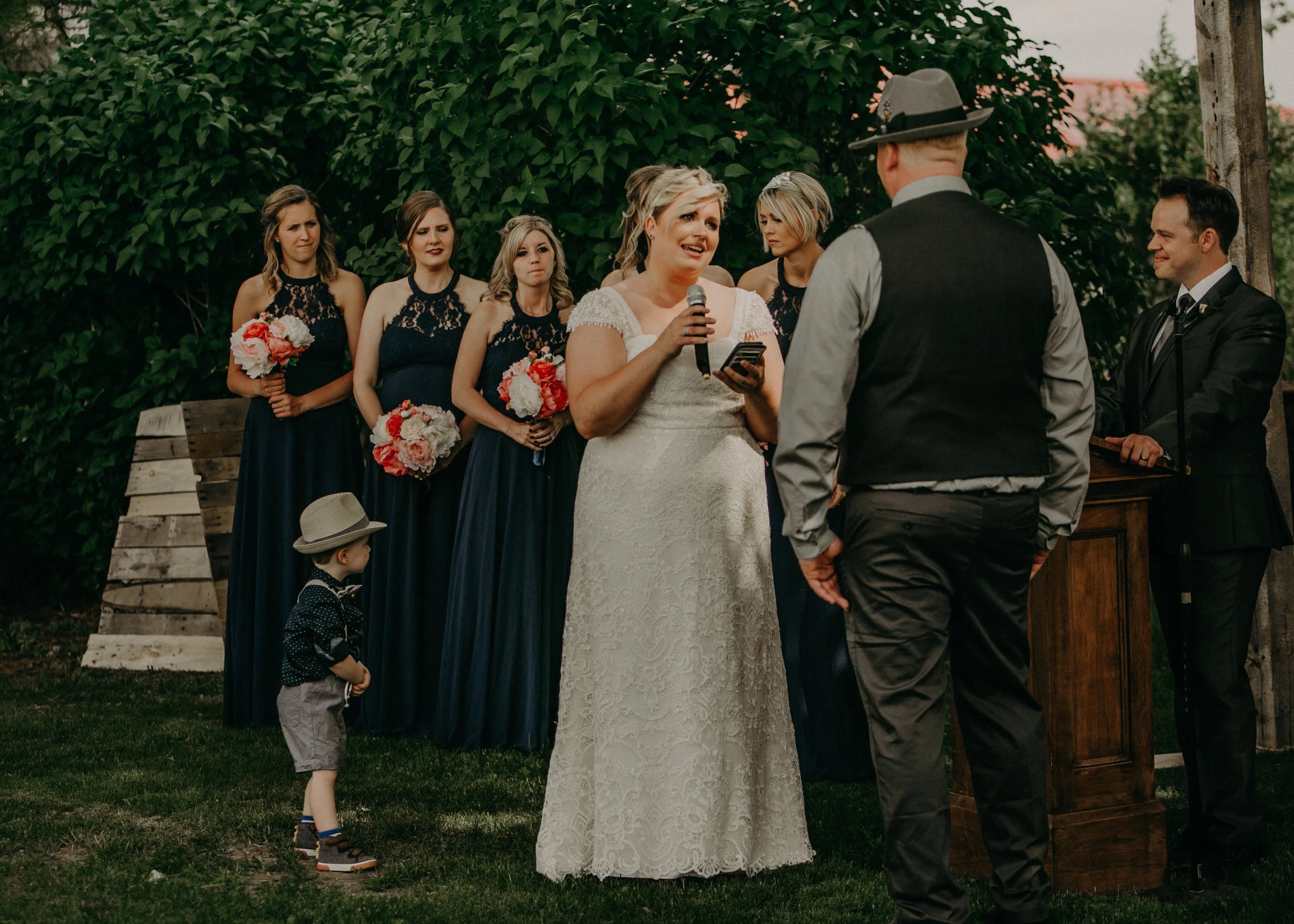 emotion caught on camera by Andrea Wagner Photography during wedding at Jean Acres Barn in Ellsworth WI