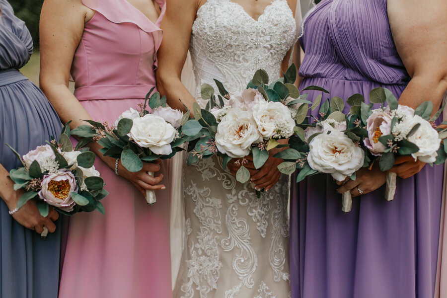 Bella Floral Design provides beautiful bouquets during a wedding in Waupaca WI