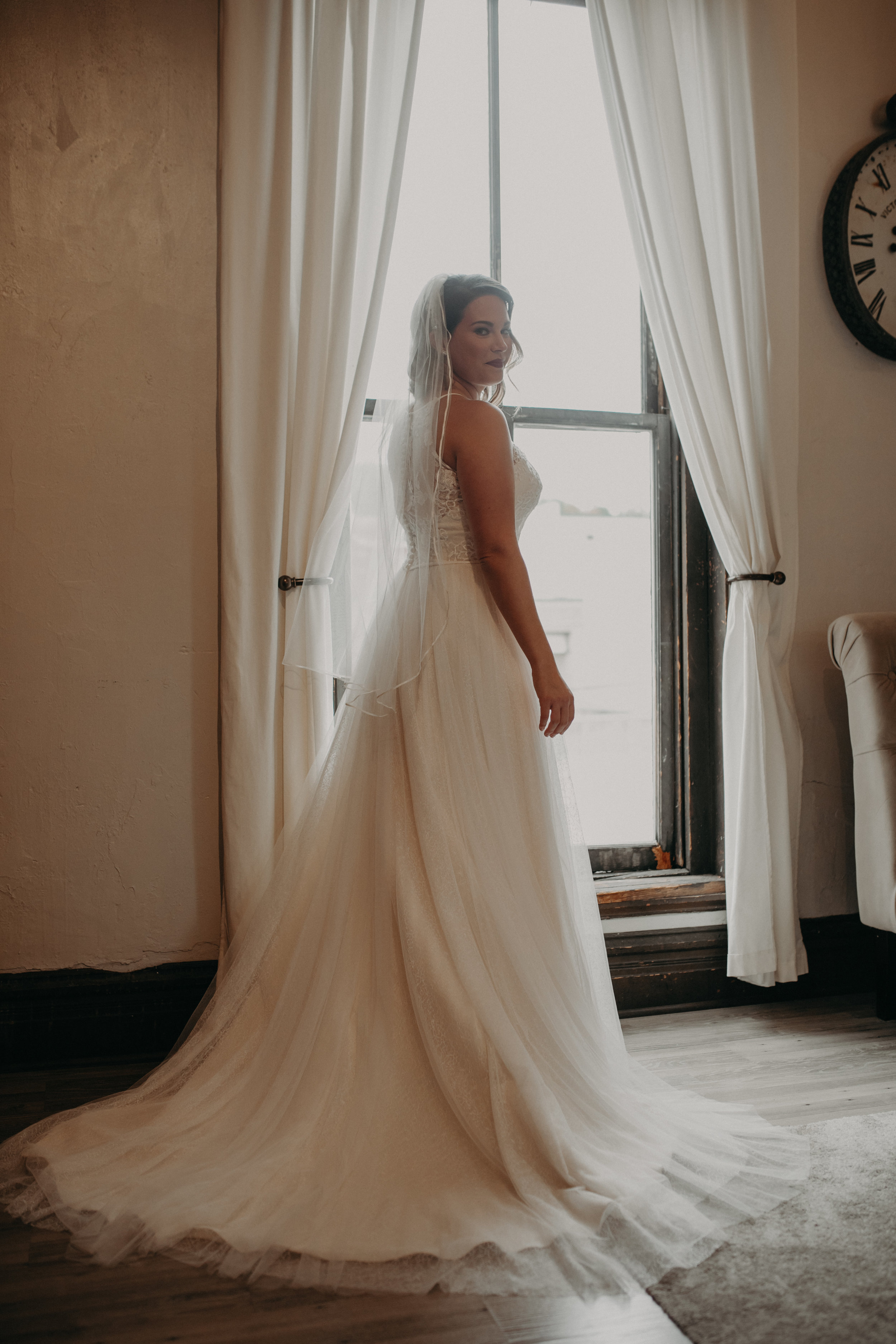 The Loft at Studio J in Stillwater MN has a bridal space with bright light and big windows perfect for wedding photography
