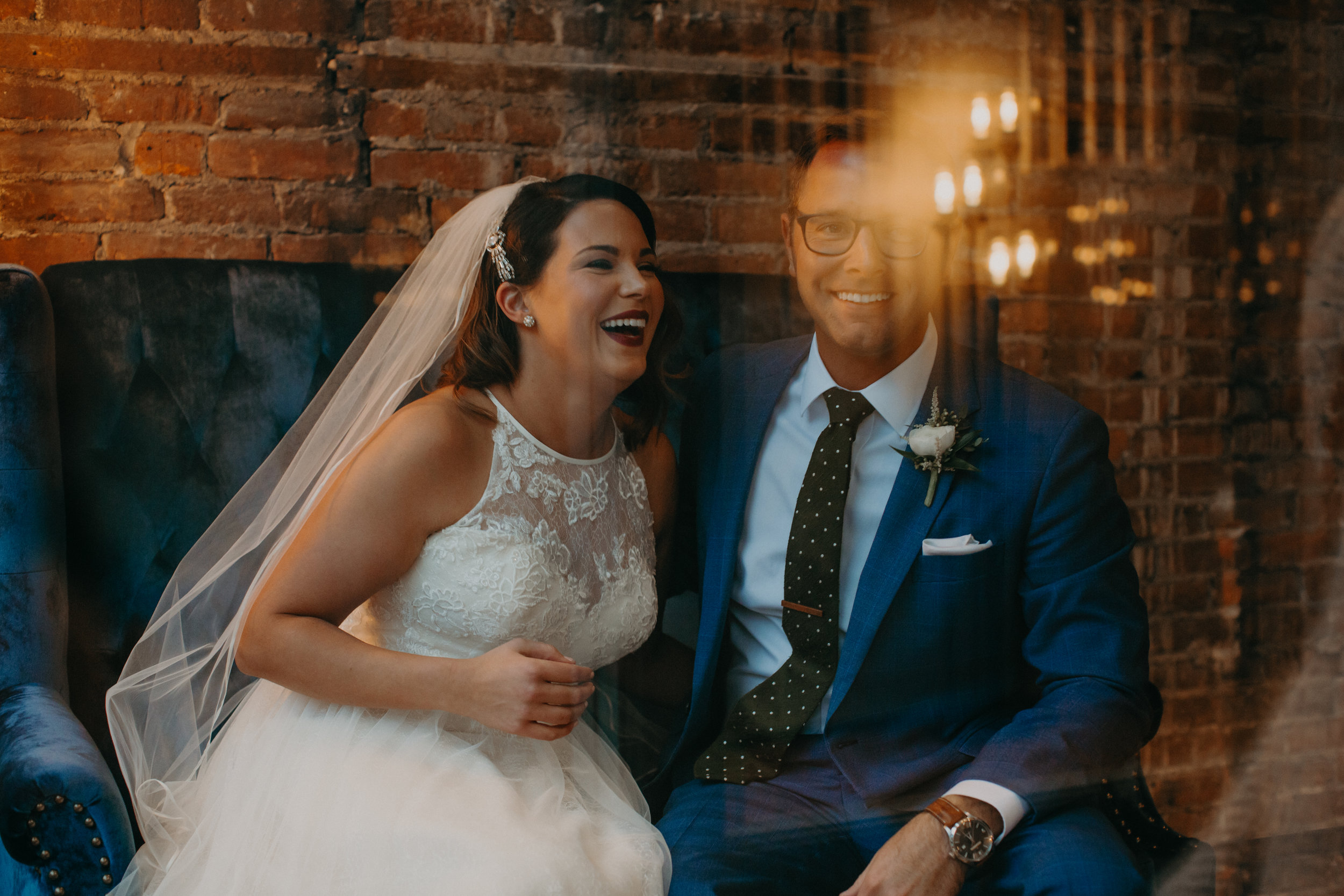 The Loft at Studio J is the perfect venue for bride and groom ceremony, reception, and portraits for the laid back and joyful wedding couple