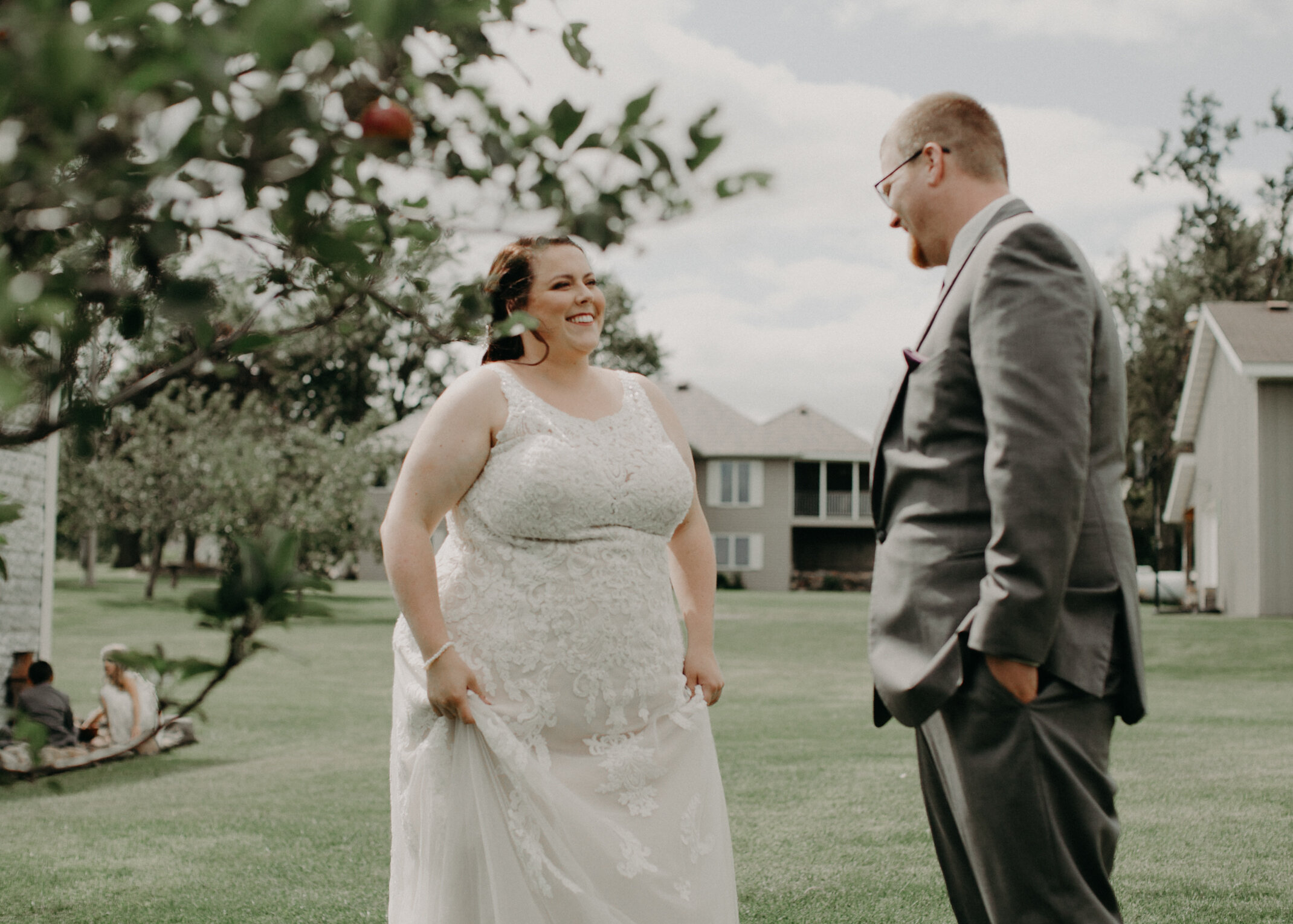  a bride and groom have their first look at their barn wedding in Clayton WI 