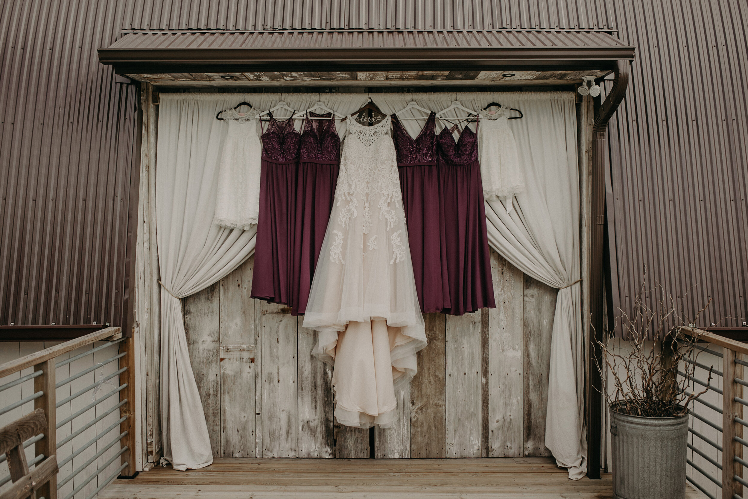  Essence of Australia wedding dress hanging from the Mumm Barn in Clayton WI 