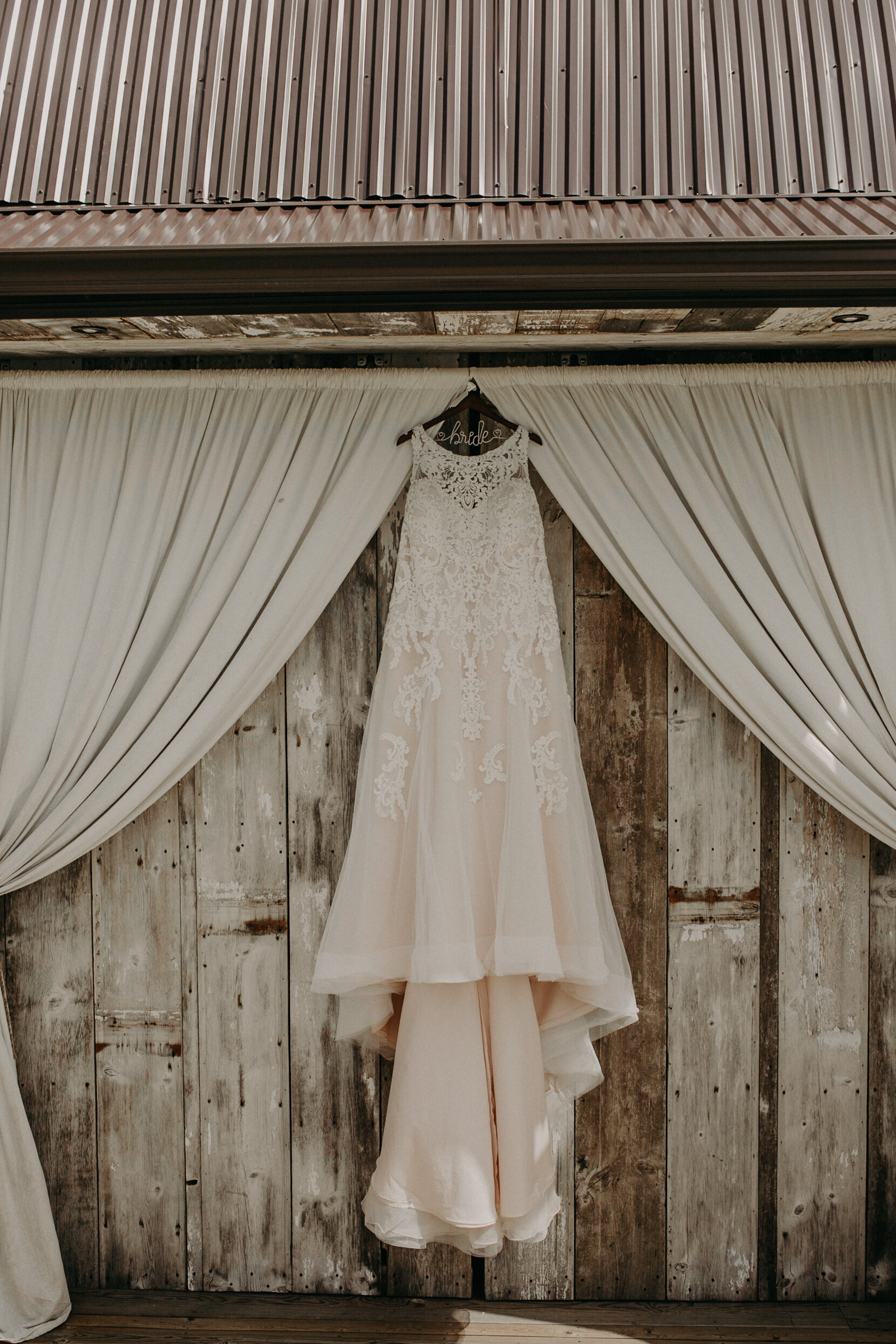  The Luxe Bridal Boutique wedding dress at The Mumm Barn in Clayton WI 