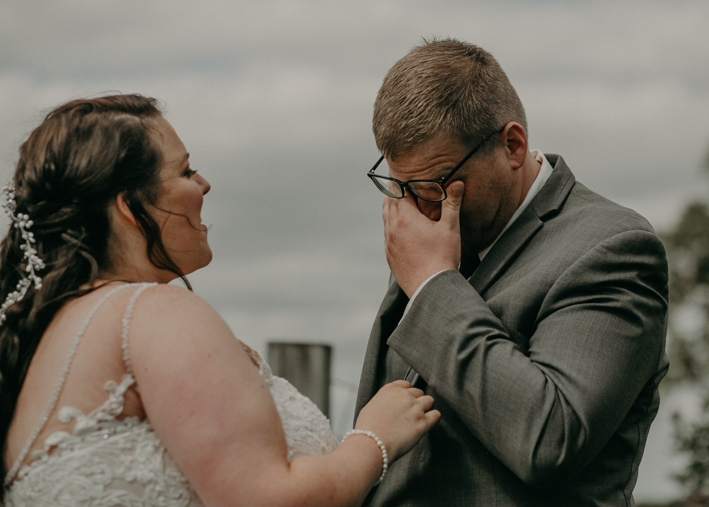  emotional first look between bride and groom in Clayton WI captured by Andrea Wagner Photography 