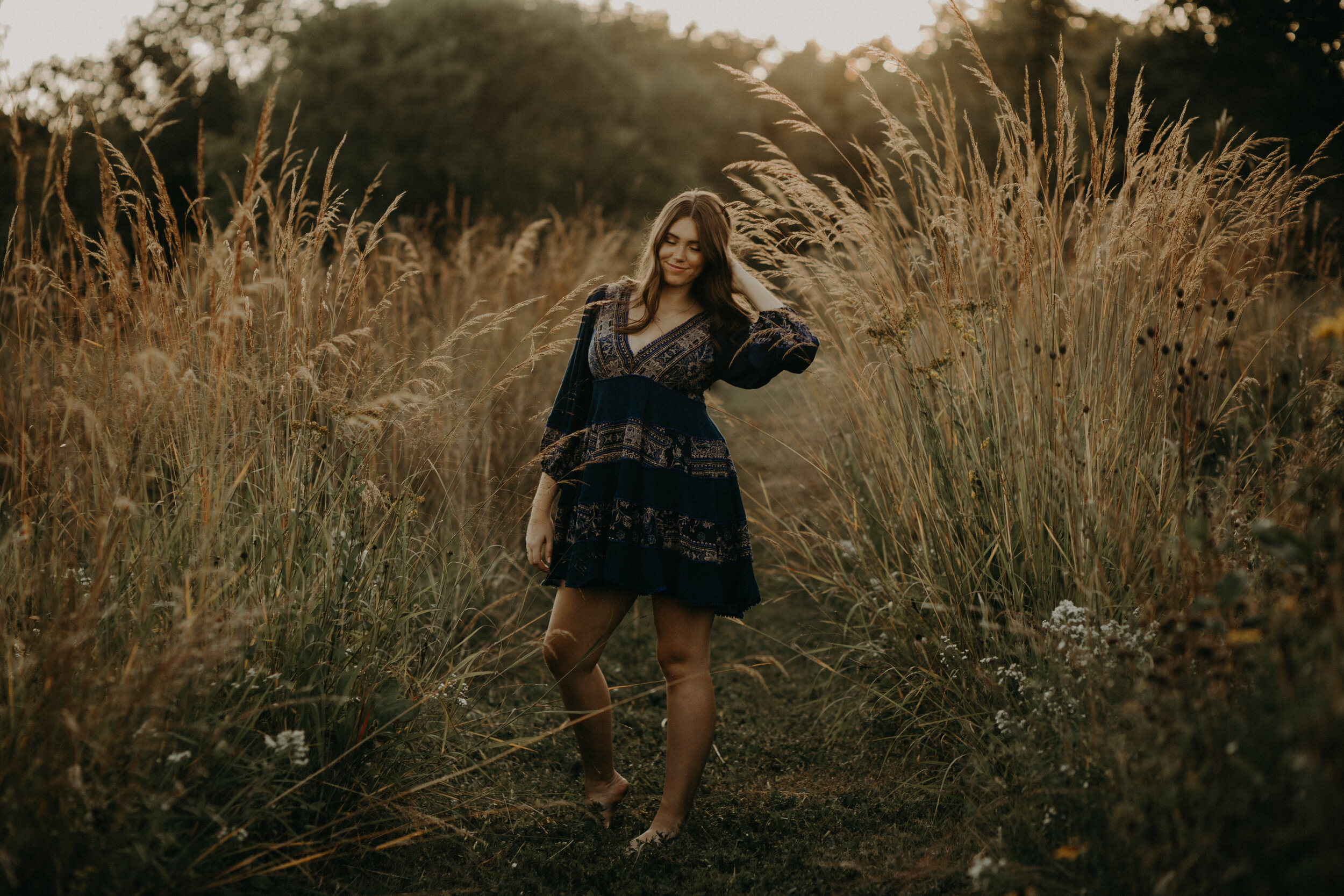  pappas grass in Hudson WI for senior photos while Carly wears Free People dress 