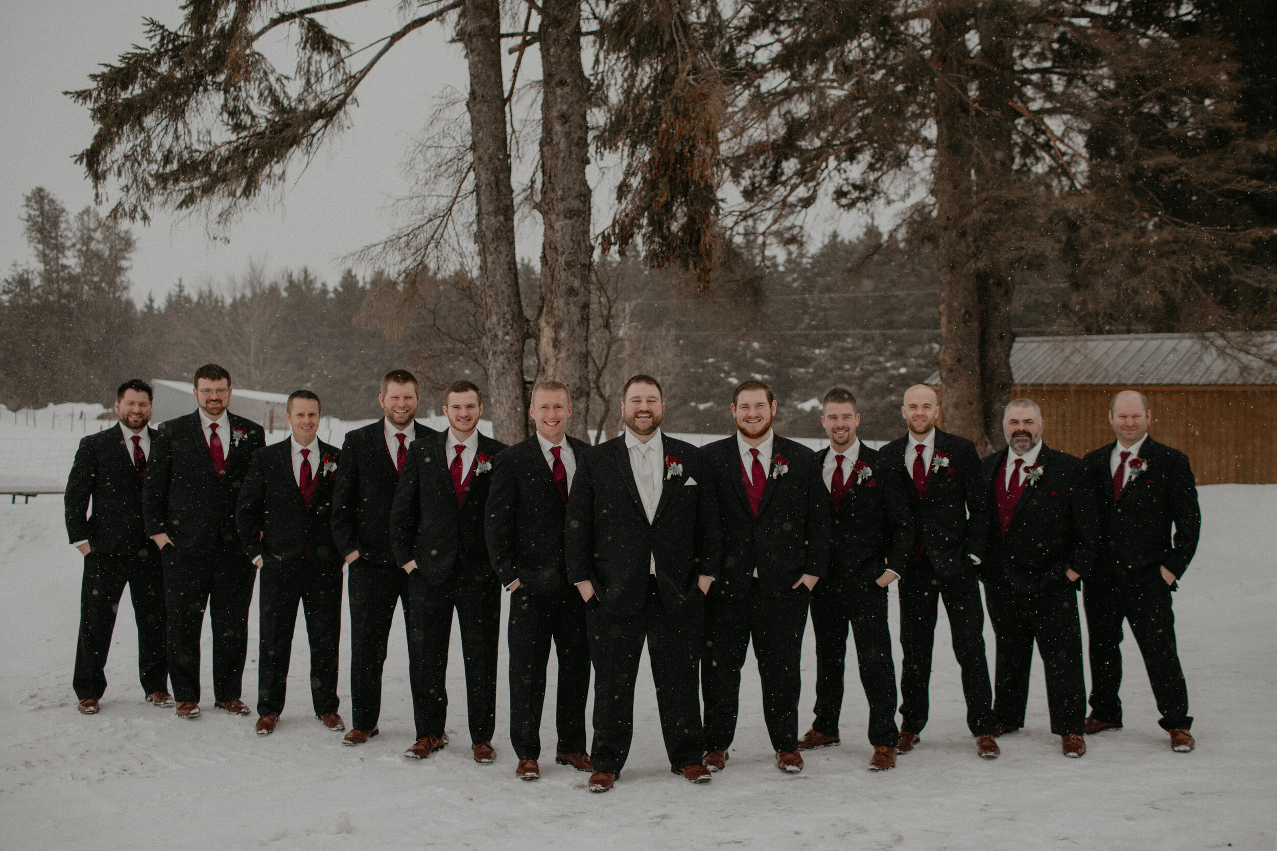  Andrea Wanger Photography cozy winter Wisconsin wedding. Perfect Wisconsin wedding in February. Elegant winter wedding groom with groomsmen. 