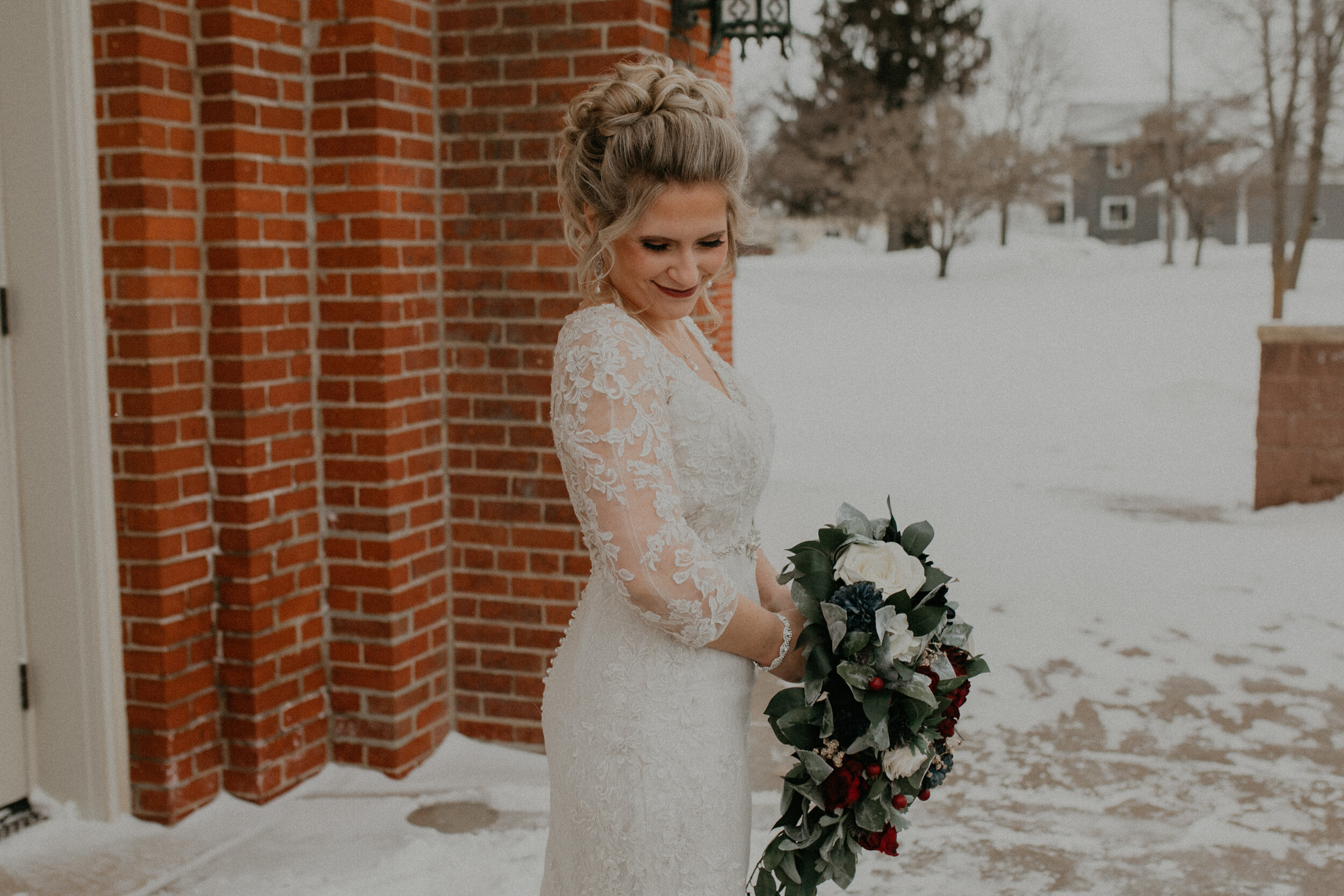  Andrea Wanger Photography cozy winter Wisconsin wedding. Perfect Wisconsin wedding in February. Elegant winter wedding bride. 