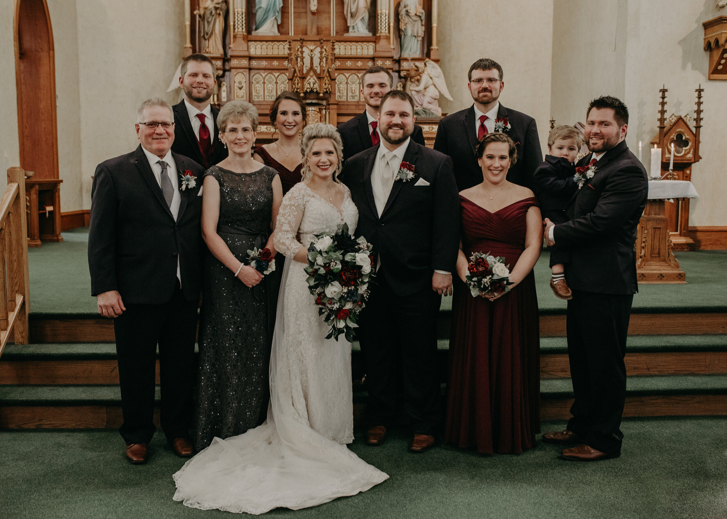  Andrea Wanger Photography cozy winter Wisconsin wedding. Perfect Wisconsin wedding in February. Elegant winter wedding family photos in church. 