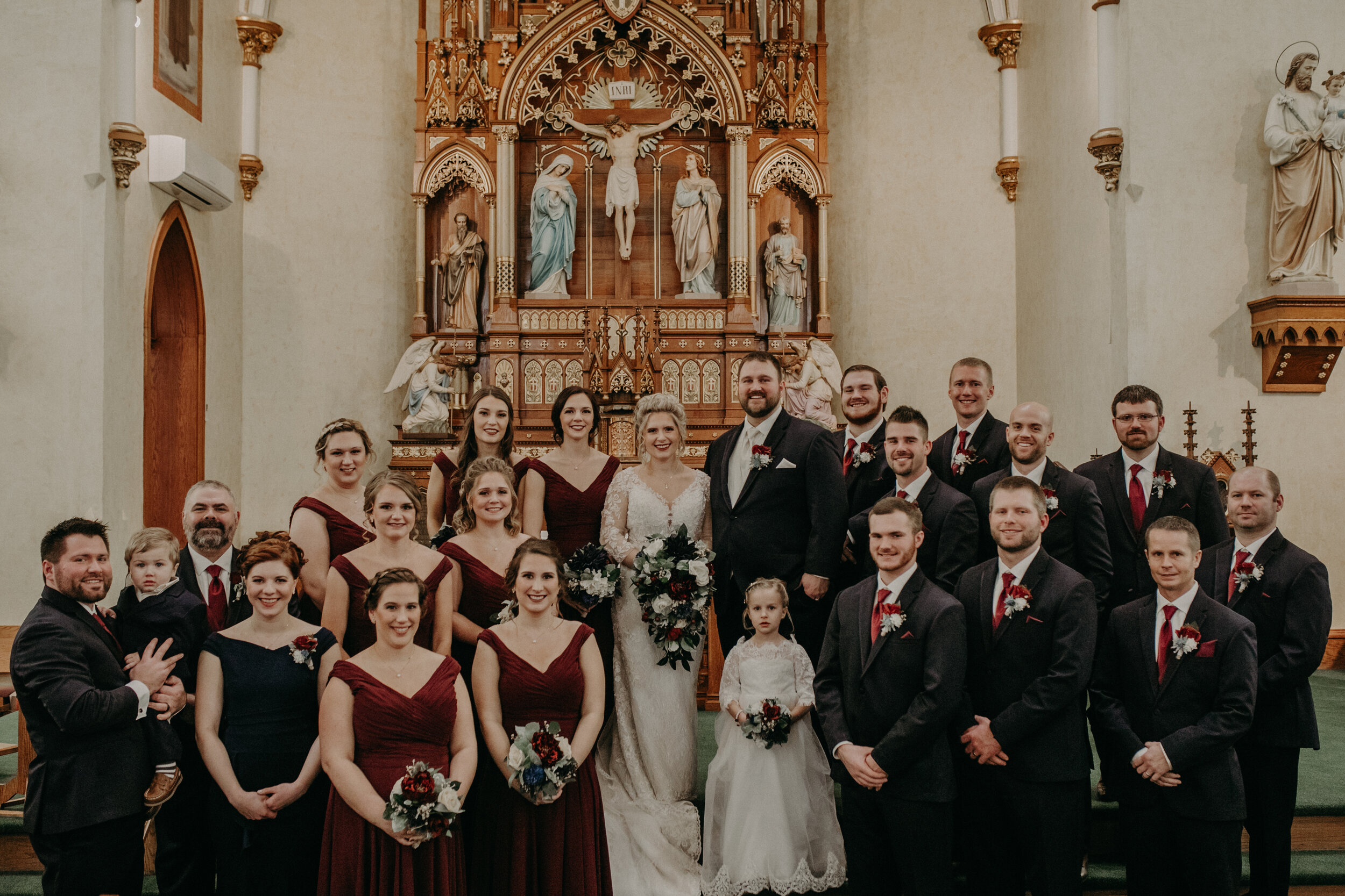  Andrea Wanger Photography cozy winter Wisconsin wedding. Perfect Wisconsin wedding in February. Elegant winter wedding. Wedding party photos in church. 