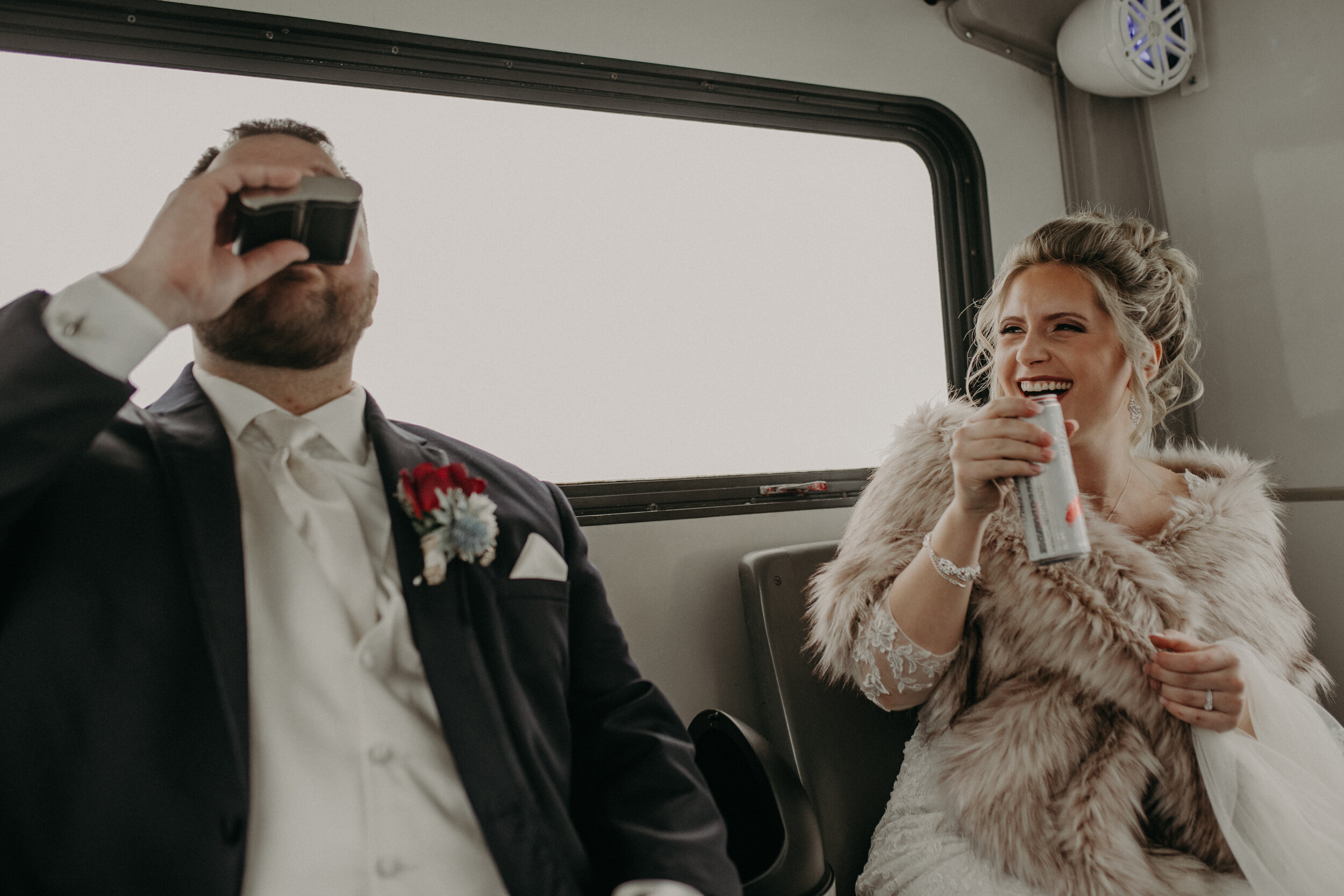  Andrea Wanger Photography cozy winter Wisconsin wedding. Perfect Wisconsin wedding in February. Elegant winter wedding. Post ceremony party bus. 