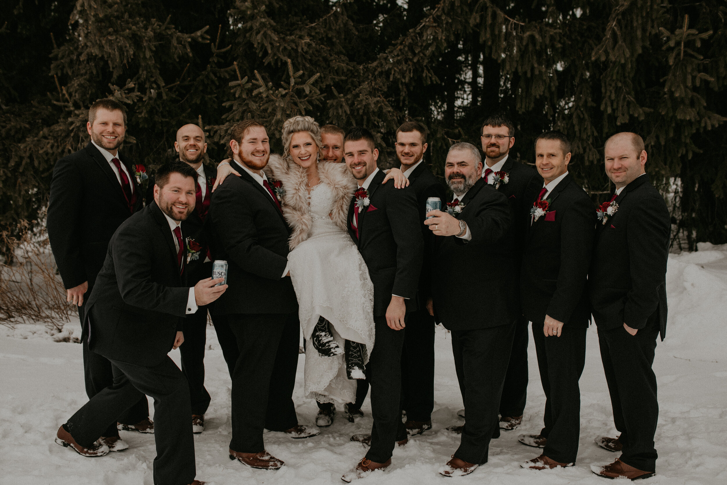  Andrea Wanger Photography cozy winter Wisconsin wedding. Perfect Wisconsin wedding in February. Elegant winter wedding. Wedding party photos outside in the snow. 