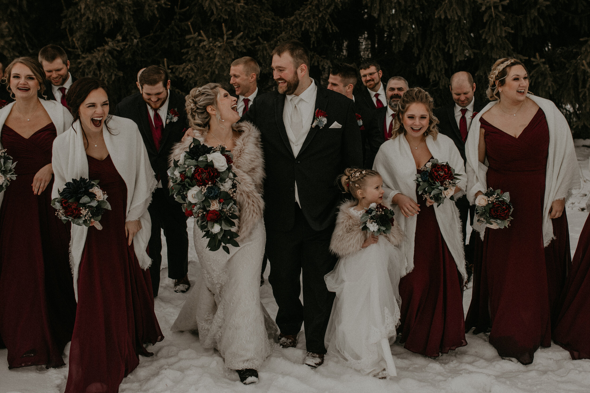  Andrea Wanger Photography cozy winter Wisconsin wedding. Perfect Wisconsin wedding in February. Elegant winter wedding. Wedding party photos outside in the snow. 