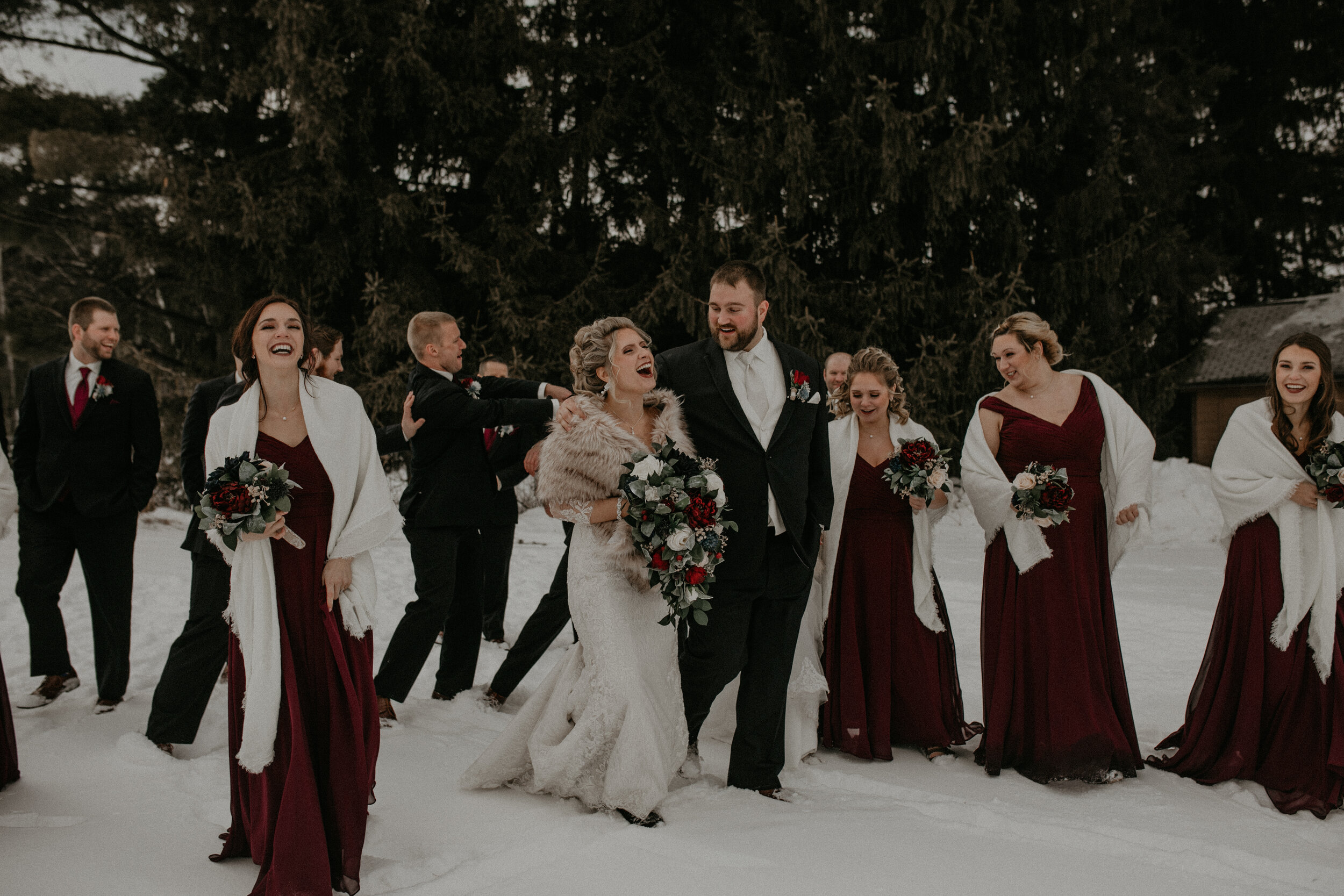  Andrea Wanger Photography cozy winter Wisconsin wedding. Perfect Wisconsin wedding in February. Elegant winter wedding. Wedding party photos outside in the snow. 