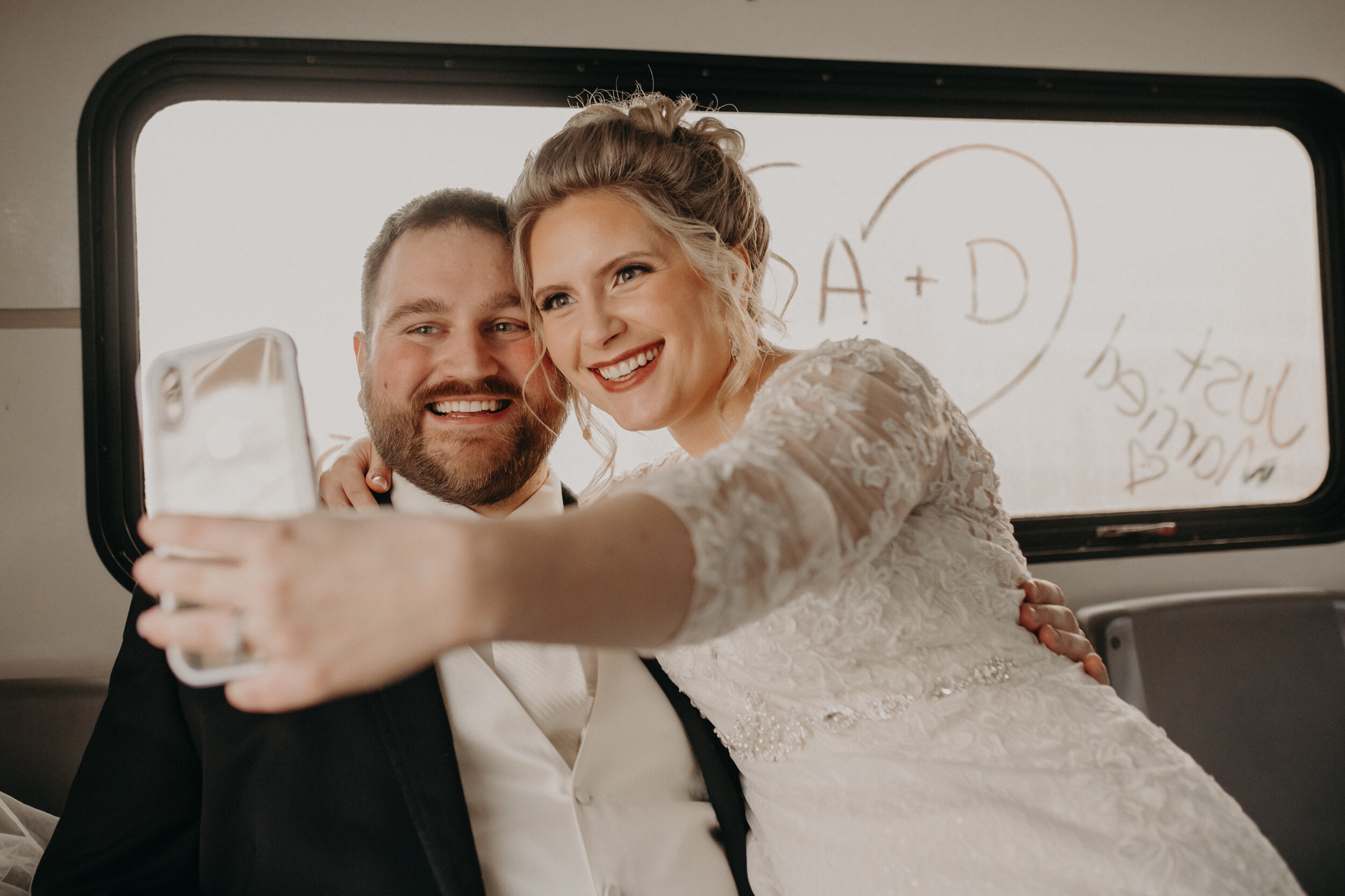  Andrea Wanger Photography cozy winter Wisconsin wedding. Perfect Wisconsin wedding in February. Elegant winter wedding. Post ceremony party bus. 