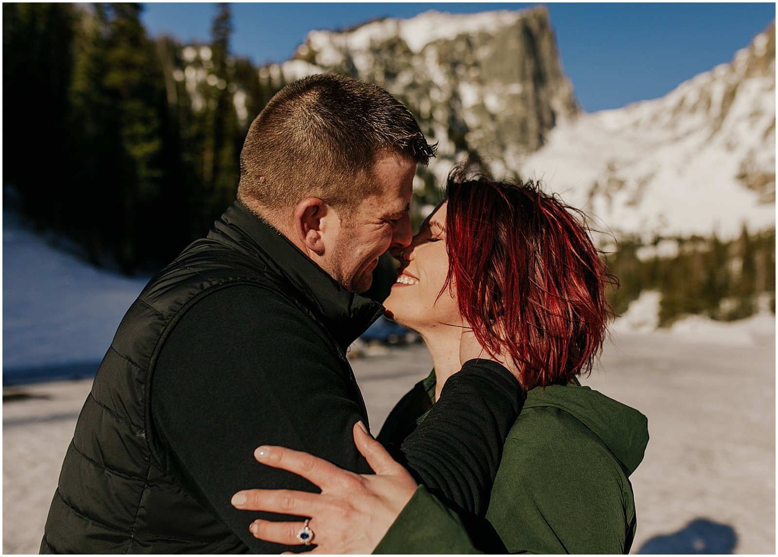 Mountain engagement photos at Dream Lake in Rocky Mountain national park Colorado 