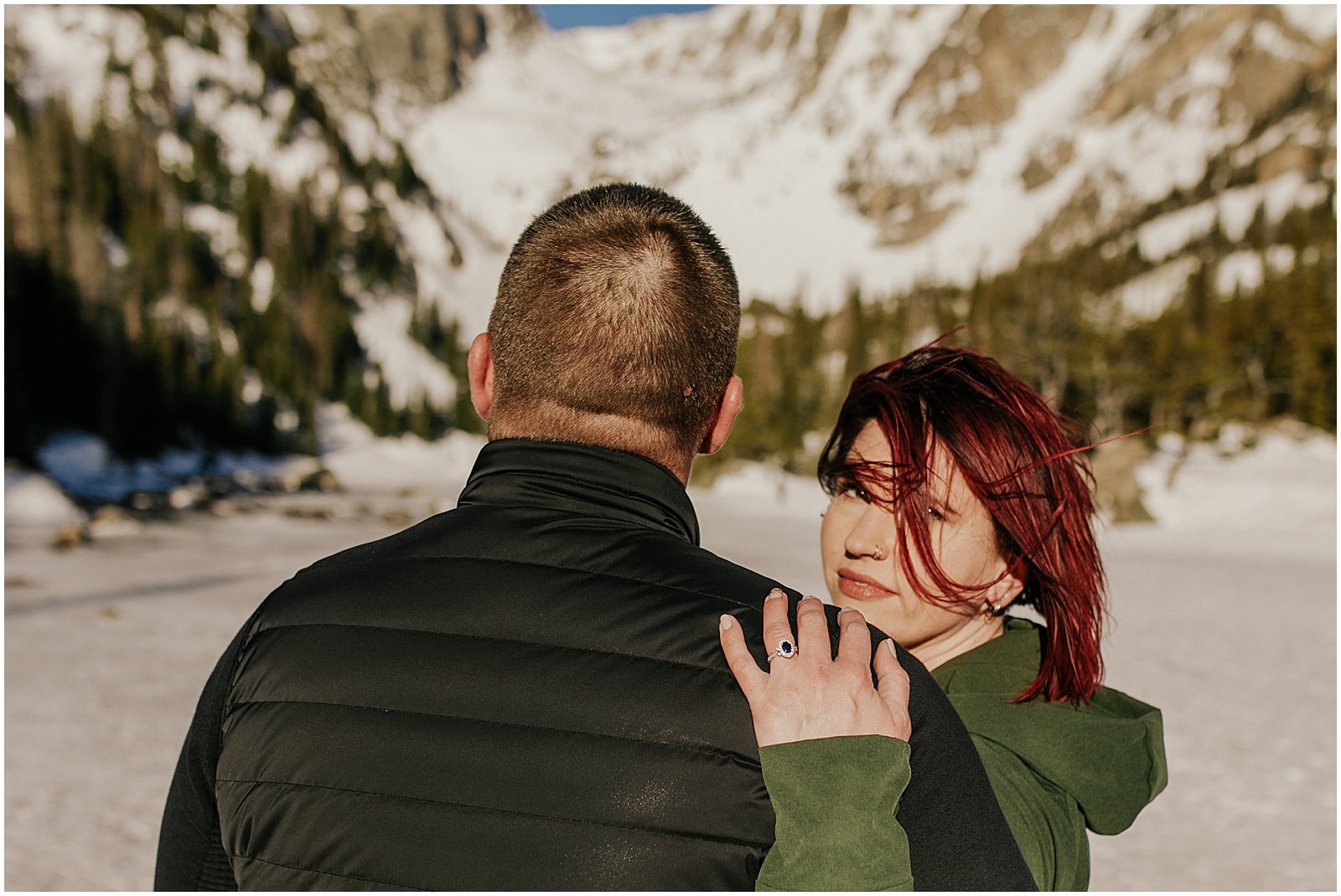 Mountain engagement photos at Dream Lake in Rocky Mountain national park Colorado 