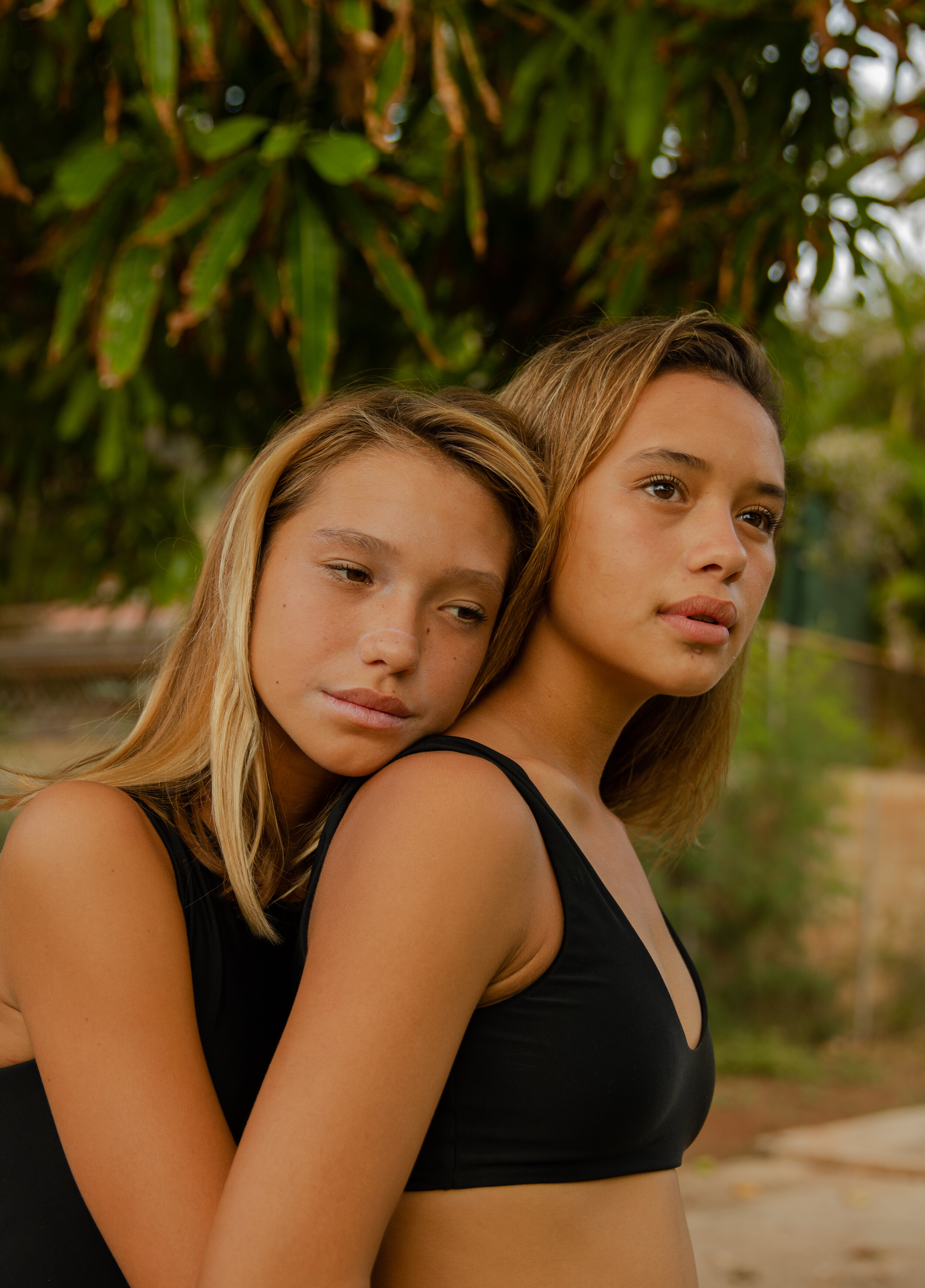  A project inspired by daily trips to Waikiki where I befriended a squad of pro teenage long-boarders and began documenting these young female surfers. 