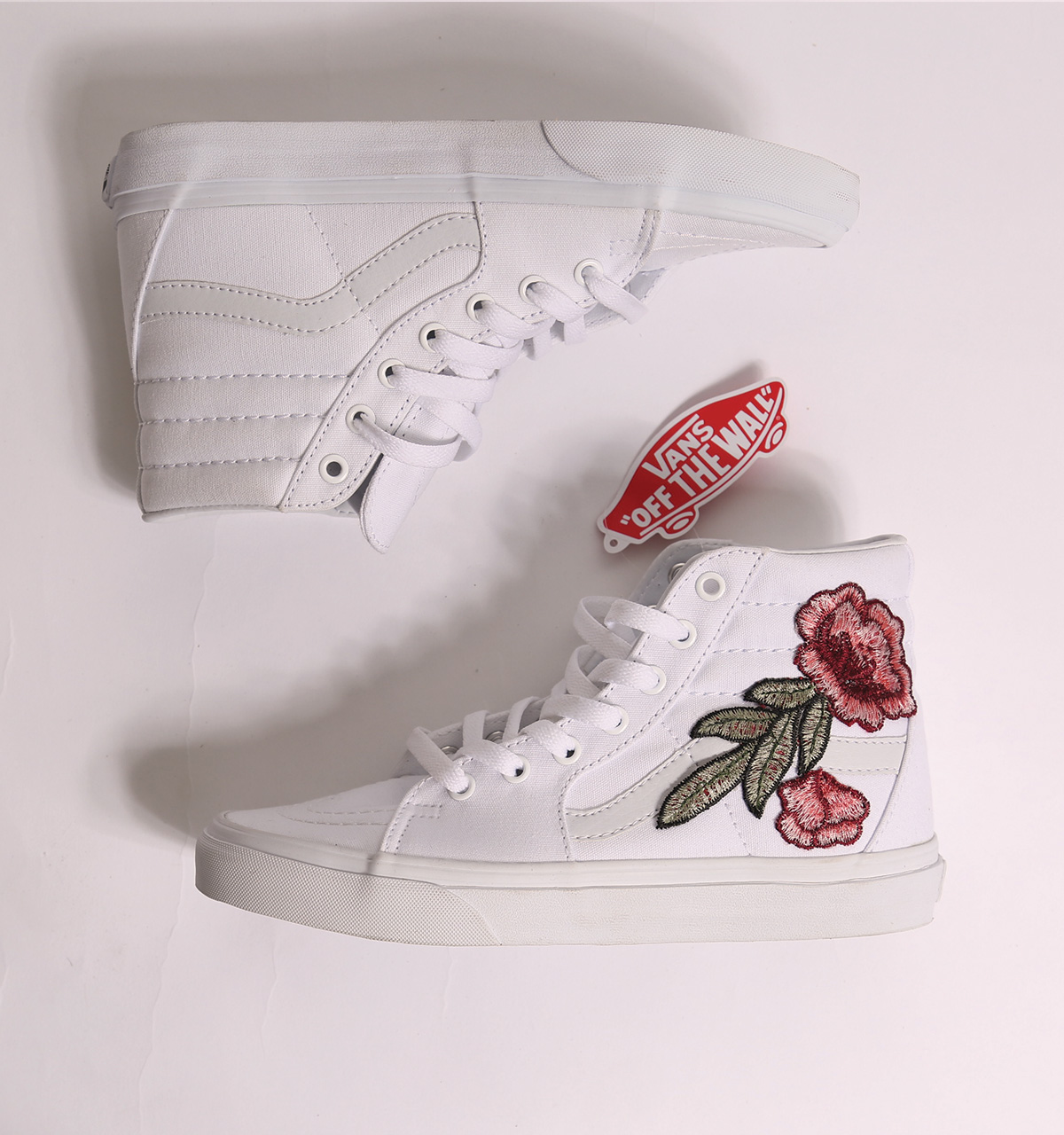 white high top vans with roses