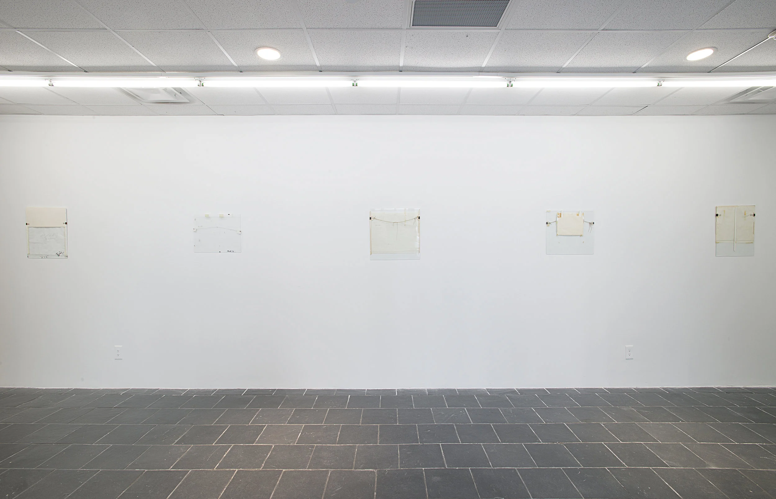 Installation view: Nahum Tevet: Works on Glass, 1972–1975 , Hunter College Art Galleries, 2016. Photo by Bill Orcutt. Left to right: Untitled #9, 1974; Untitled #13, 1974/2016; Untitled #7, 1972; Untitled #5, 1972; Untitled #6, 1972. 