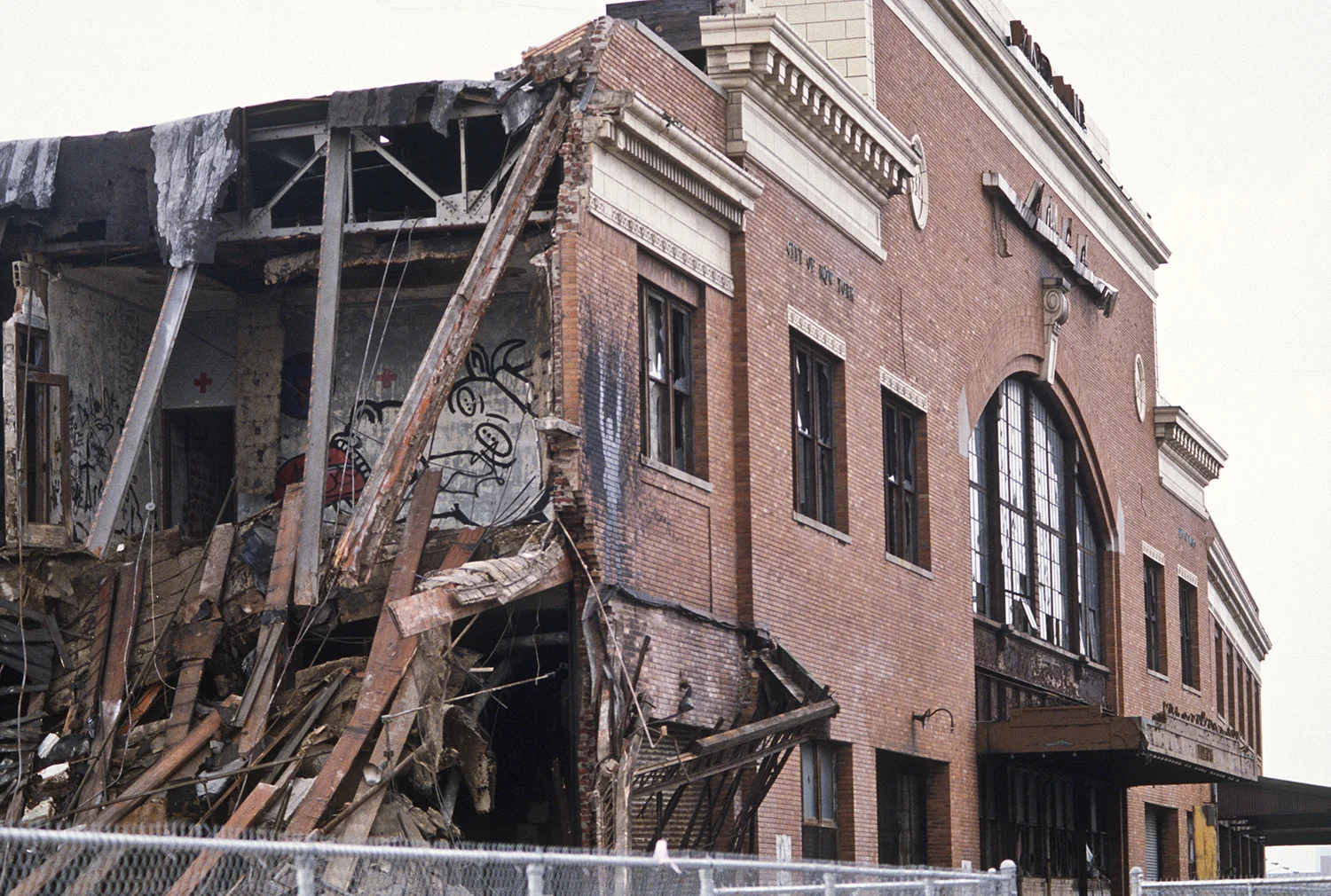 Andreas Sterzing, Pier 34 Demolition (Wojnarowicz’s Gagging Cow and Richard Hambleton shadow painting are visible) , 1984. Courtesy of the artist and Hunter College Art Galleries, New York. 