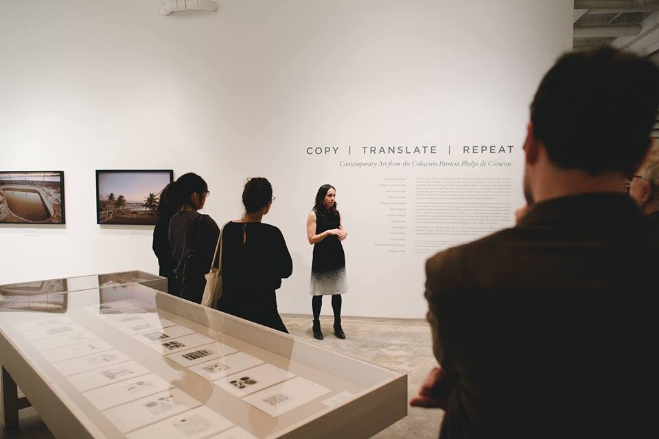  Harper Montgomery leading a tour of  Copy, Translate, Repeat: Contemporary Art from the Colección Patricia Phelps de Cisneros.  Photograph by Natalie Conn.    