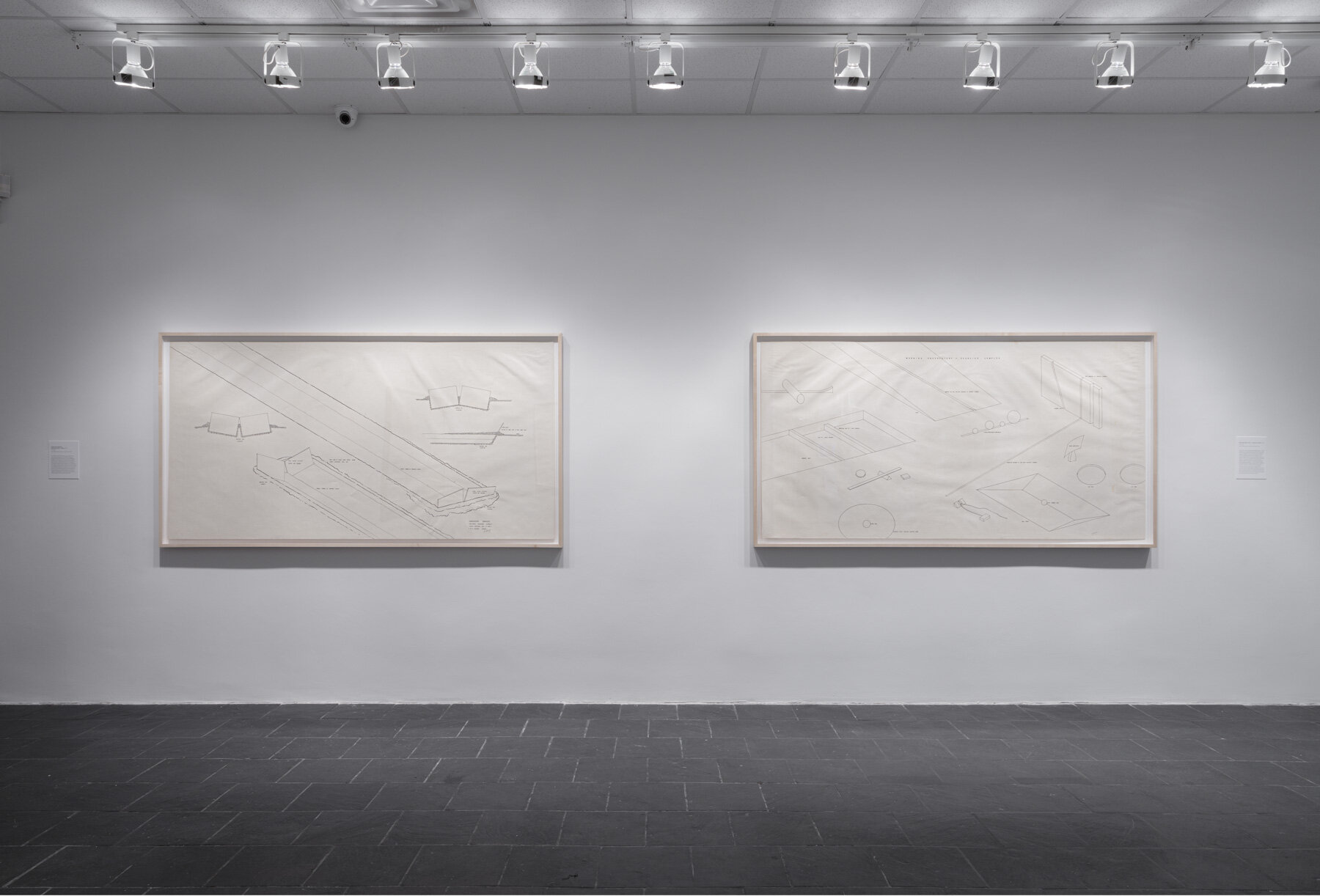  Installation view:  Robert Morris: Para-architectural projects , Hunter College Art Galleries, 2019.LEFT: Observatory Markers, Equinox Sunrise–Sunset , 1971. Ink on paper, 42 x 82 ½ in. (107 x 210 cm). Estate of Robert Morris, courtesy Castelli Gall